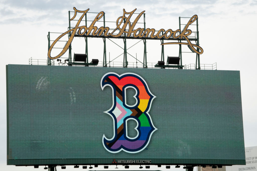 A rainbow Red Sox logo on the video board at Fenway Park