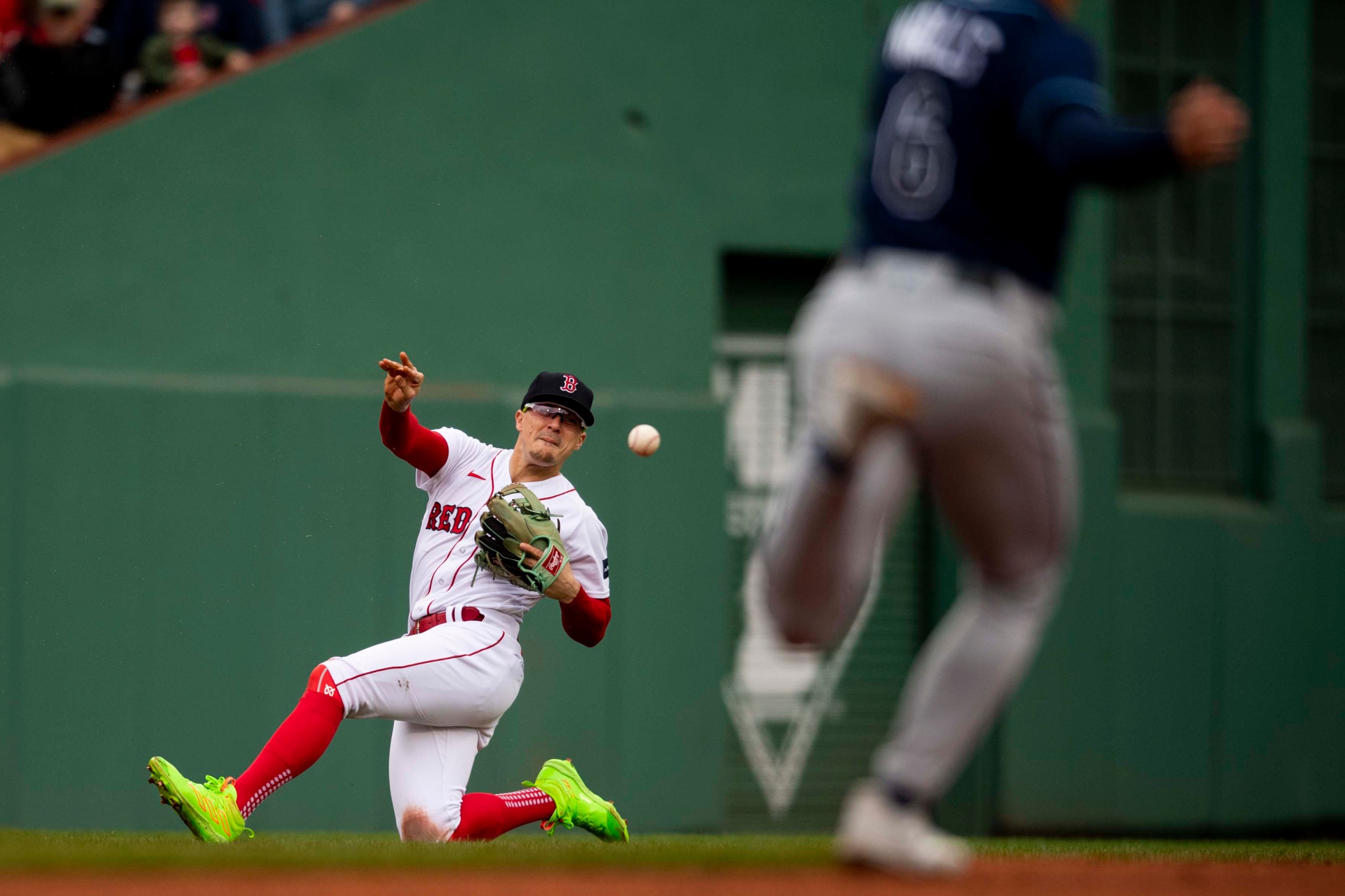 Enrique Hernandez #5 of the Boston Red Sox makes an error as he throws to second base during the second inning of a game against the Tampa Bay Rays on June 3, 2023 at Fenway Park in Boston, Massachusetts.