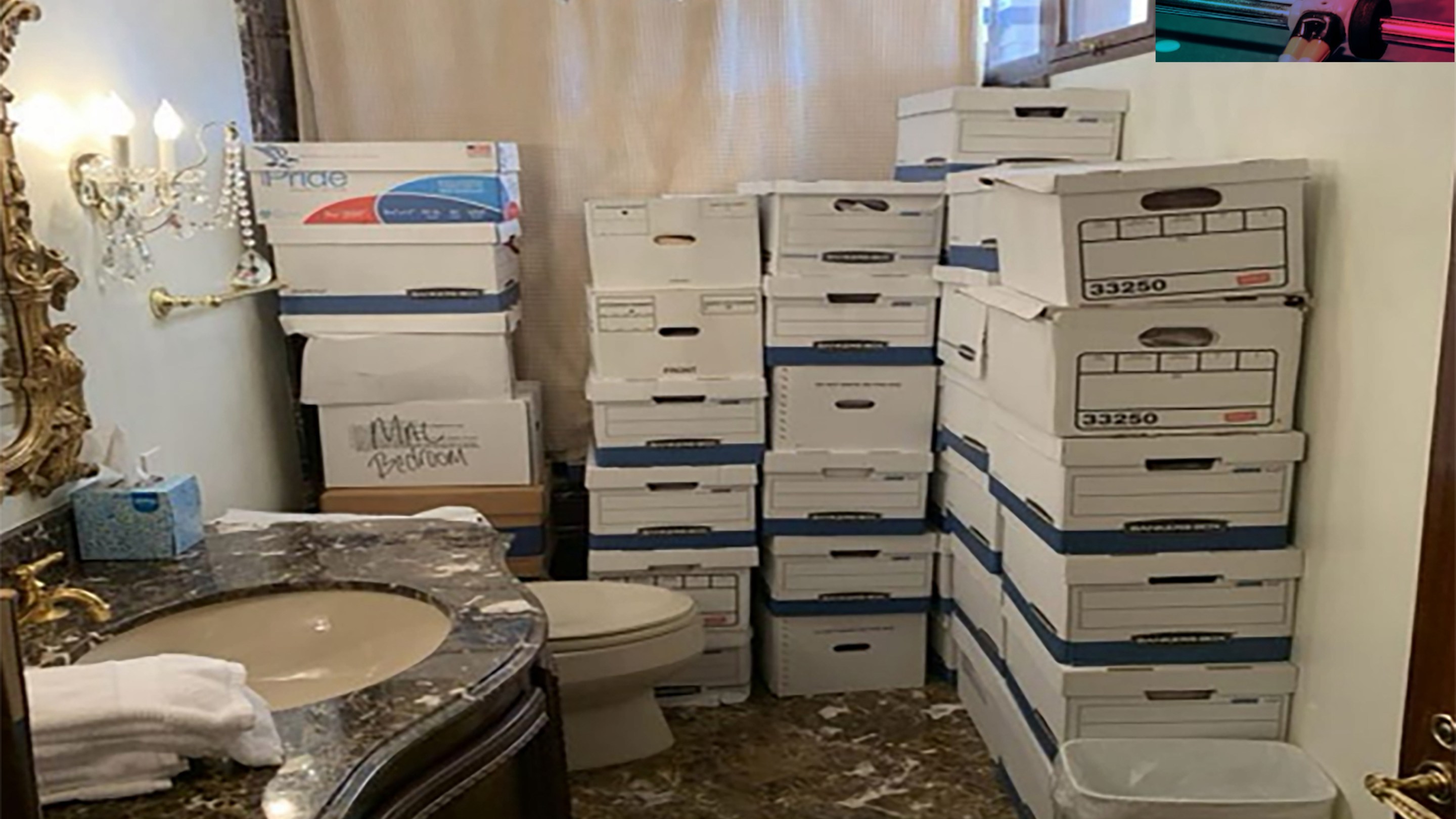 A bathroom at Mar-a-Lago positively jammed with boxes full of junk.