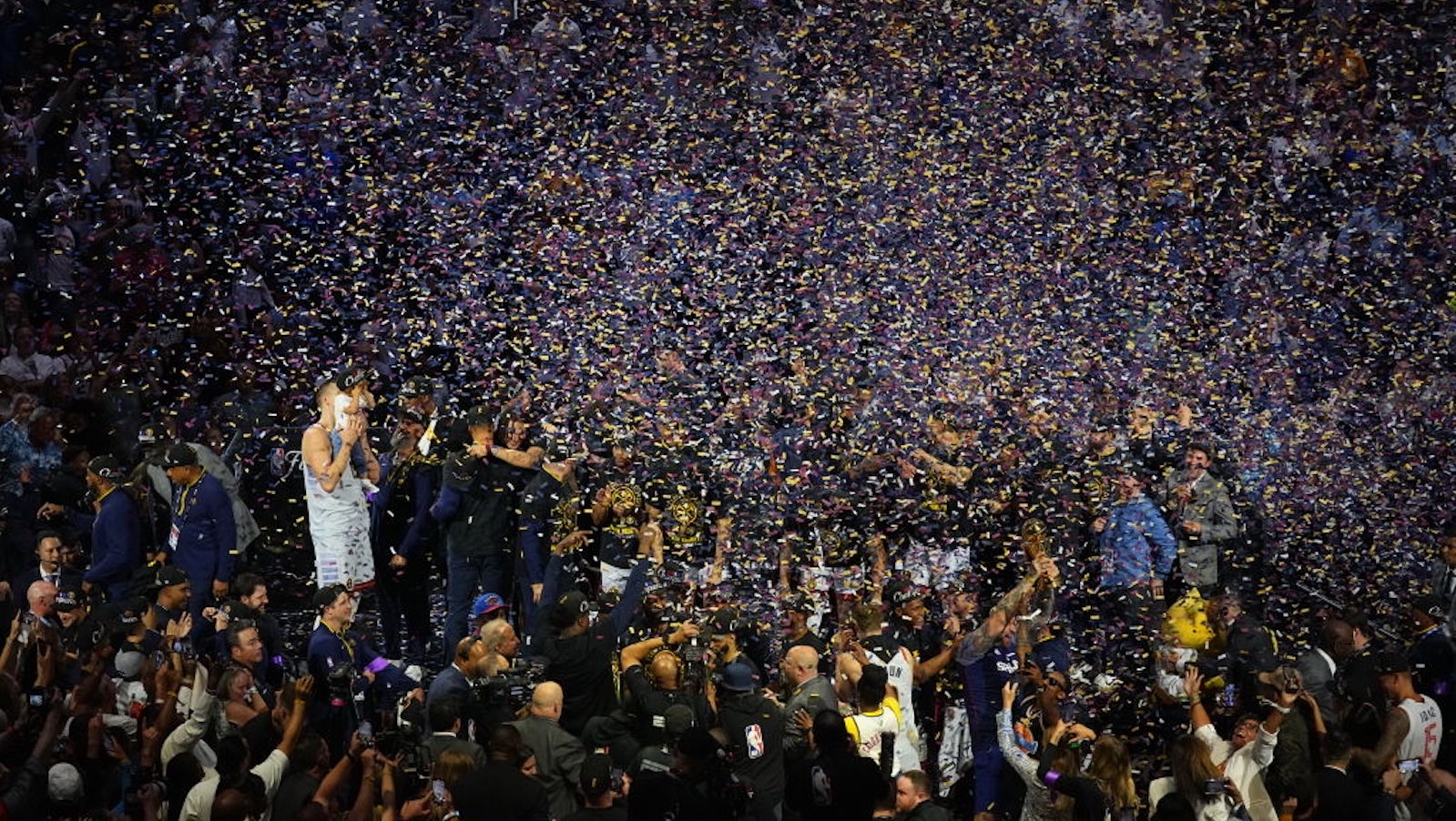 DENVER, CO - JUNE 12: A overall view of the Denver Nuggets team during the post-game celebration during Game Five of the 2023 NBA Finals on June 12, 2023 at the Ball Arena in Denver, Colorado. NOTE TO USER: User expressly acknowledges and agrees that, by downloading and/or using this Photograph, user is consenting to the terms and conditions of the Getty Images License Agreement. Mandatory Copyright Notice: Copyright 2023 NBAE