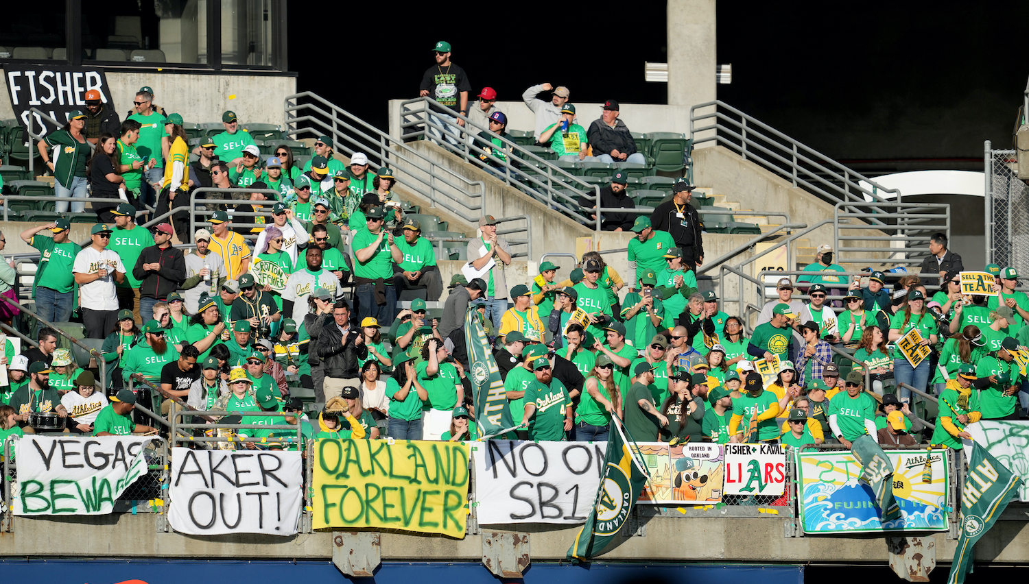 OAKLAND, CALIFORNIA - JUNE 13: Oakland Athletics fans display signs during a reverse boycott game against the Tampa Bay Rays at RingCentral Coliseum on June 13, 2023 in Oakland, California. (Photo by Brandon Vallance/Getty Images)