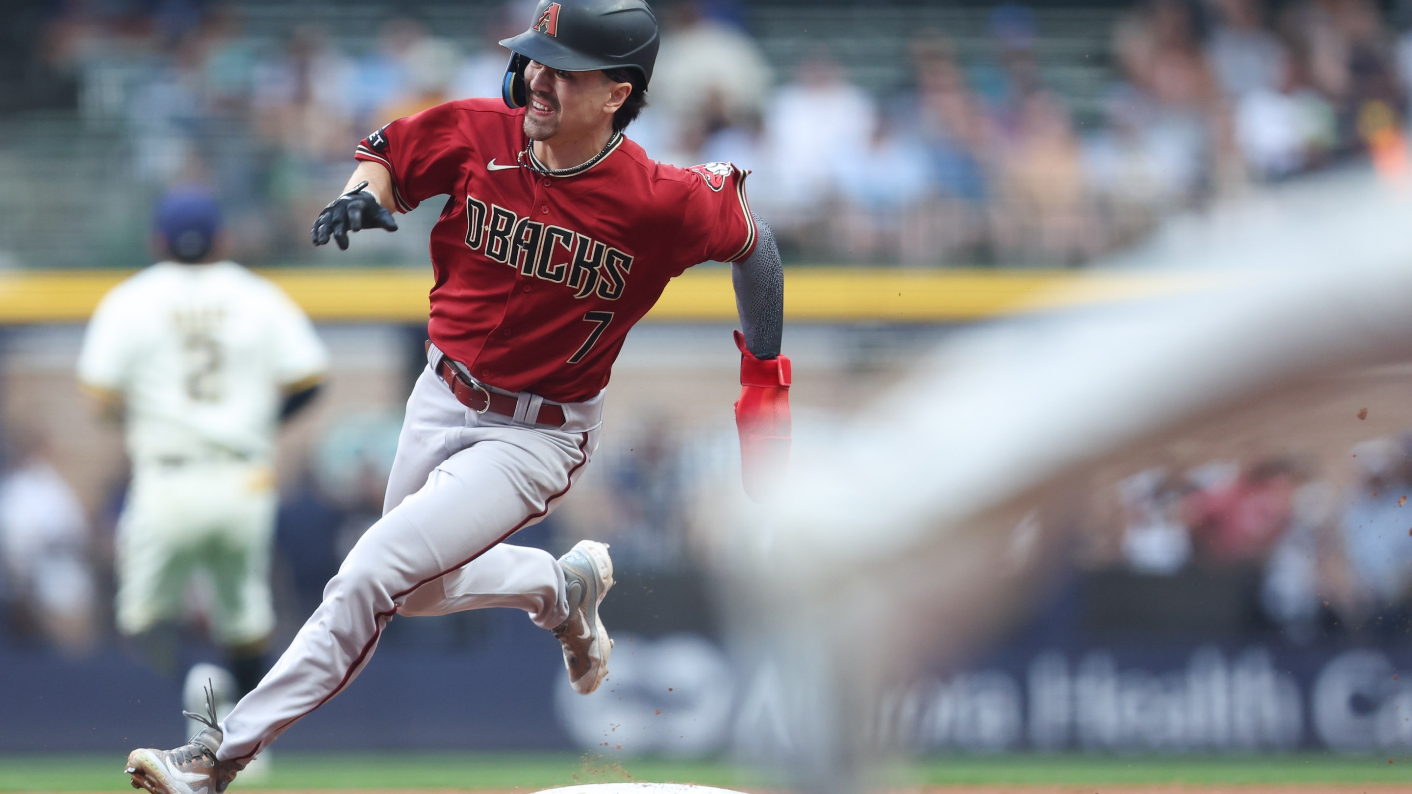 MILWAUKEE, WI - JUNE 20: Corbin Carroll #7 of the Arizona Diamondbacks rounds second base in the first inning during the game between the Arizona Diamondbacks and the Milwaukee Brewers at American Family Field on Tuesday, June 20, 2023 in Milwaukee, Wisconsin.