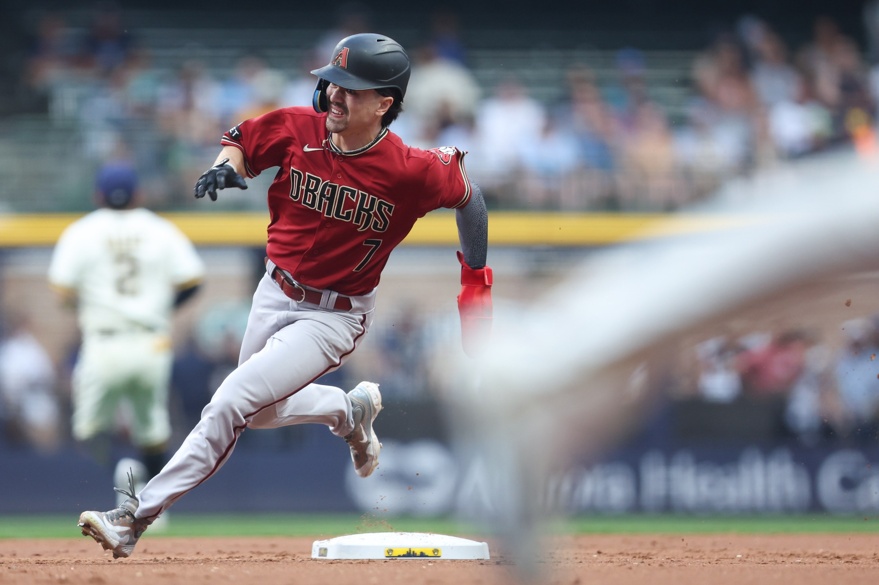 MILWAUKEE, WI - JUNE 20: Corbin Carroll #7 of the Arizona Diamondbacks rounds second base in the first inning during the game between the Arizona Diamondbacks and the Milwaukee Brewers at American Family Field on Tuesday, June 20, 2023 in Milwaukee, Wisconsin.