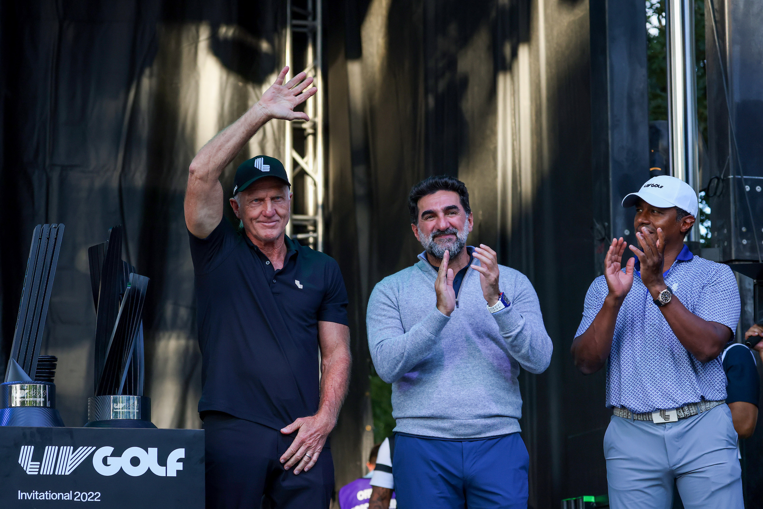 Greg Norman stands with Yasir Al-Rumayyan at a LIV Golf event.