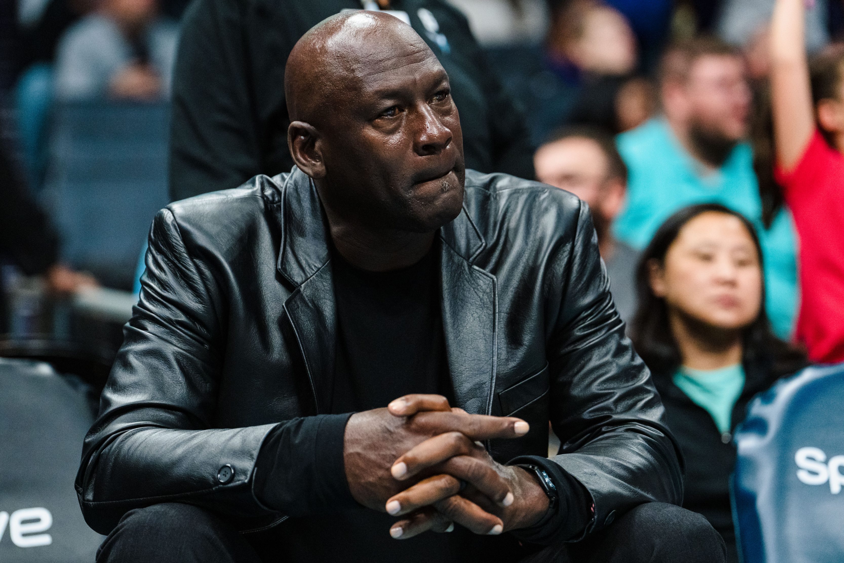 Michael Jordan on the sideline of a Charlotte Hornets game in March of 2023.