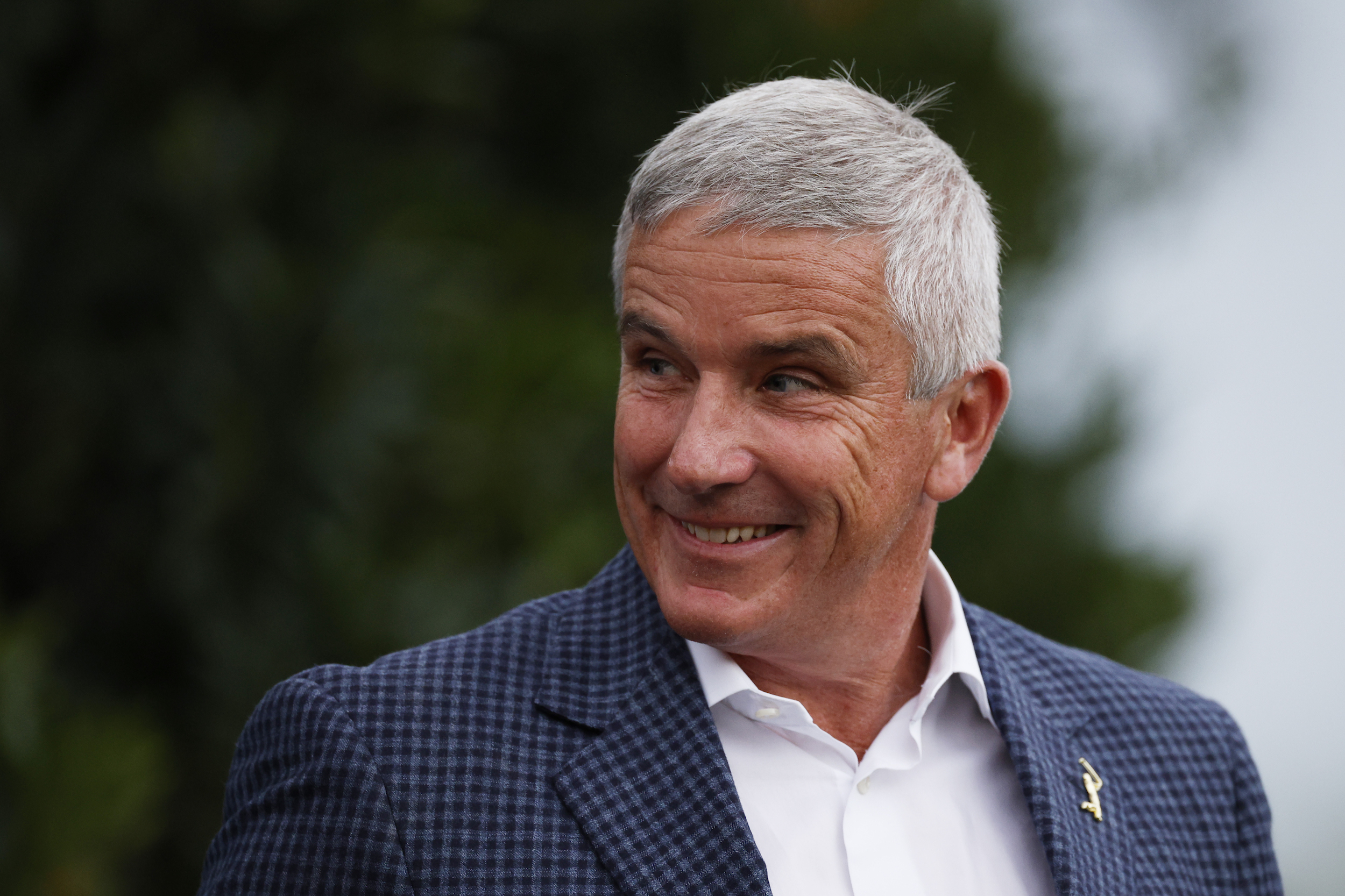 PGA Tour commissioner Jay Monahan smiles.