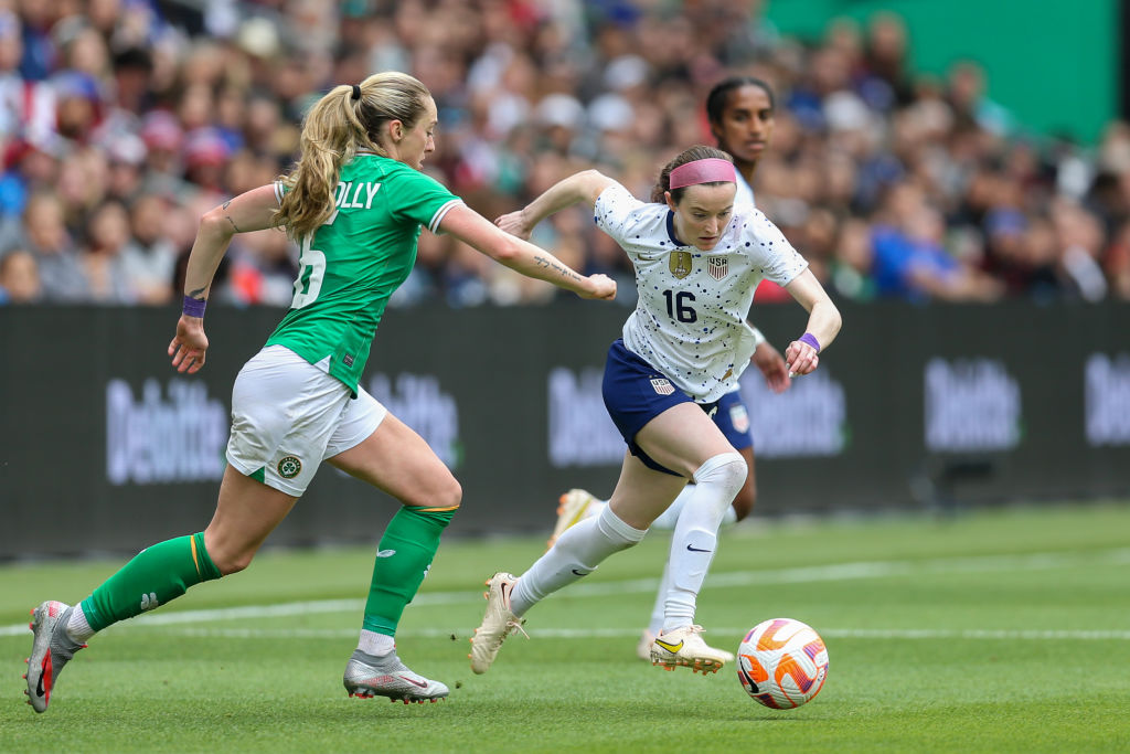 AUSTIN, TX - APRIL 8: Rose Lavelle #16 of the United States dribbles past Megan Connolly #6 of the Republic of Ireland during a game between Ireland and the United States at Q2 Stadium on April 8, 2023 in Austin, Texas.