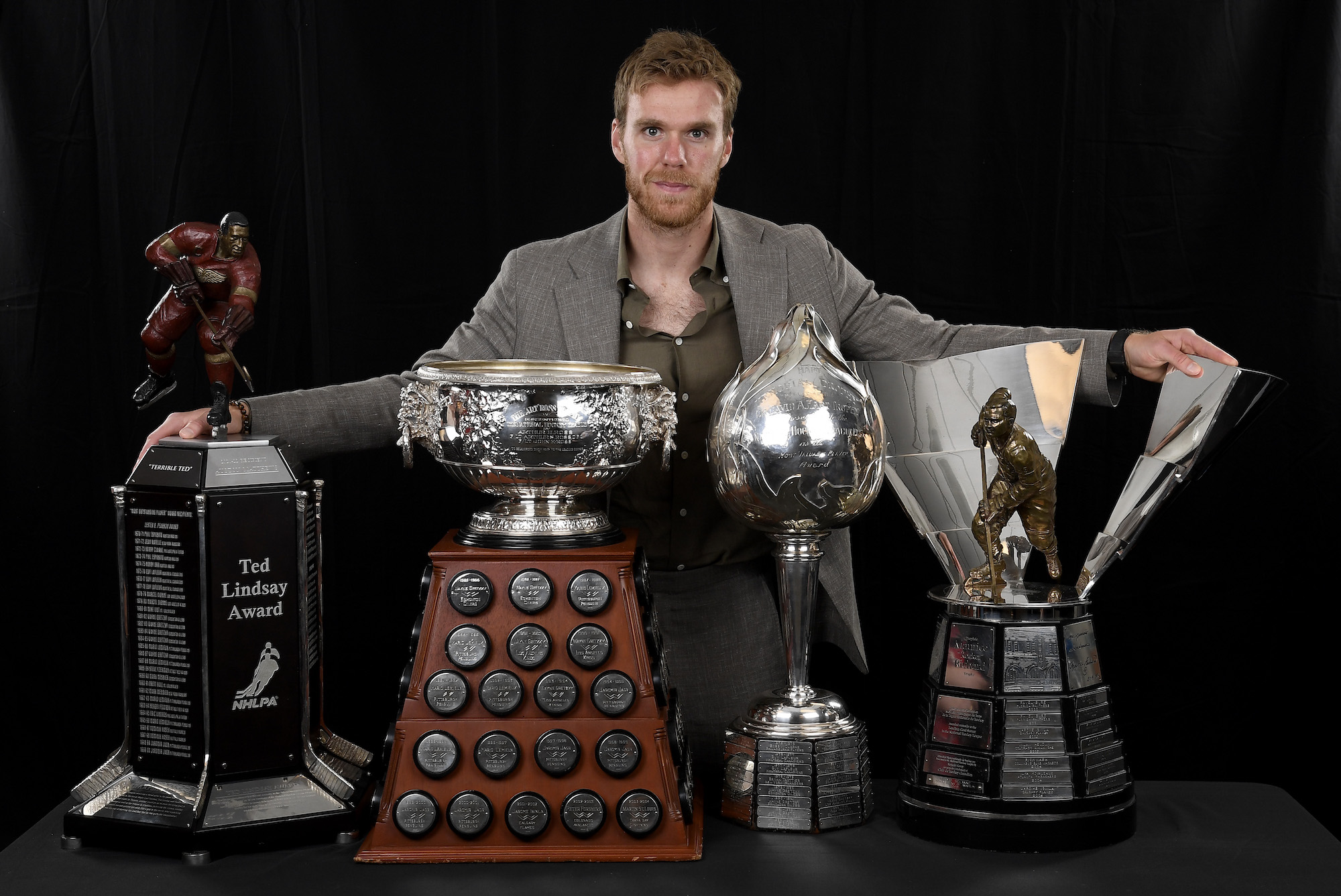 NASHVILLE, TENNESSEE - JUNE 26: Connor McDavid poses with the Ted Lindsay Award, The Art Ross Trophy, Hart Trophy, and Maurice 'Rocket' Richard Trophy at the 2023 NHL Awards at Bridgestone Arena on June 26, 2023 in Nashville, Tennessee. (Photo by Brian Babineau/NHLI via Getty Images)