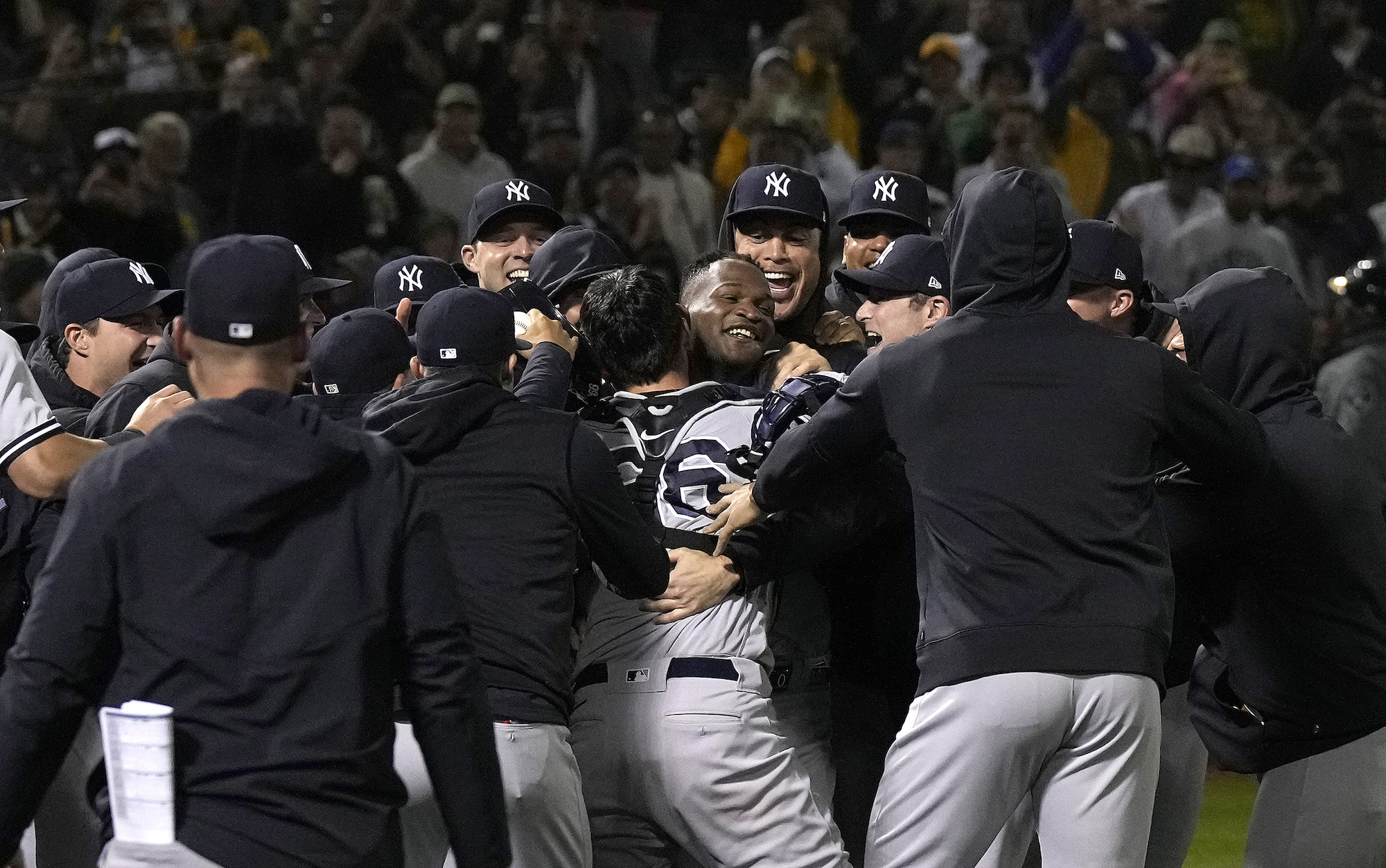 OAKLAND, CALIFORNIA - JUNE 28: Domingo German #0 of the New York Yankees celebrates his no-hit perfect game against the Oakland Athletics, defeating them 11-0 at RingCentral Coliseum on June 28, 2023 in Oakland, California. (Photo by Thearon W. Henderson/Getty Images)