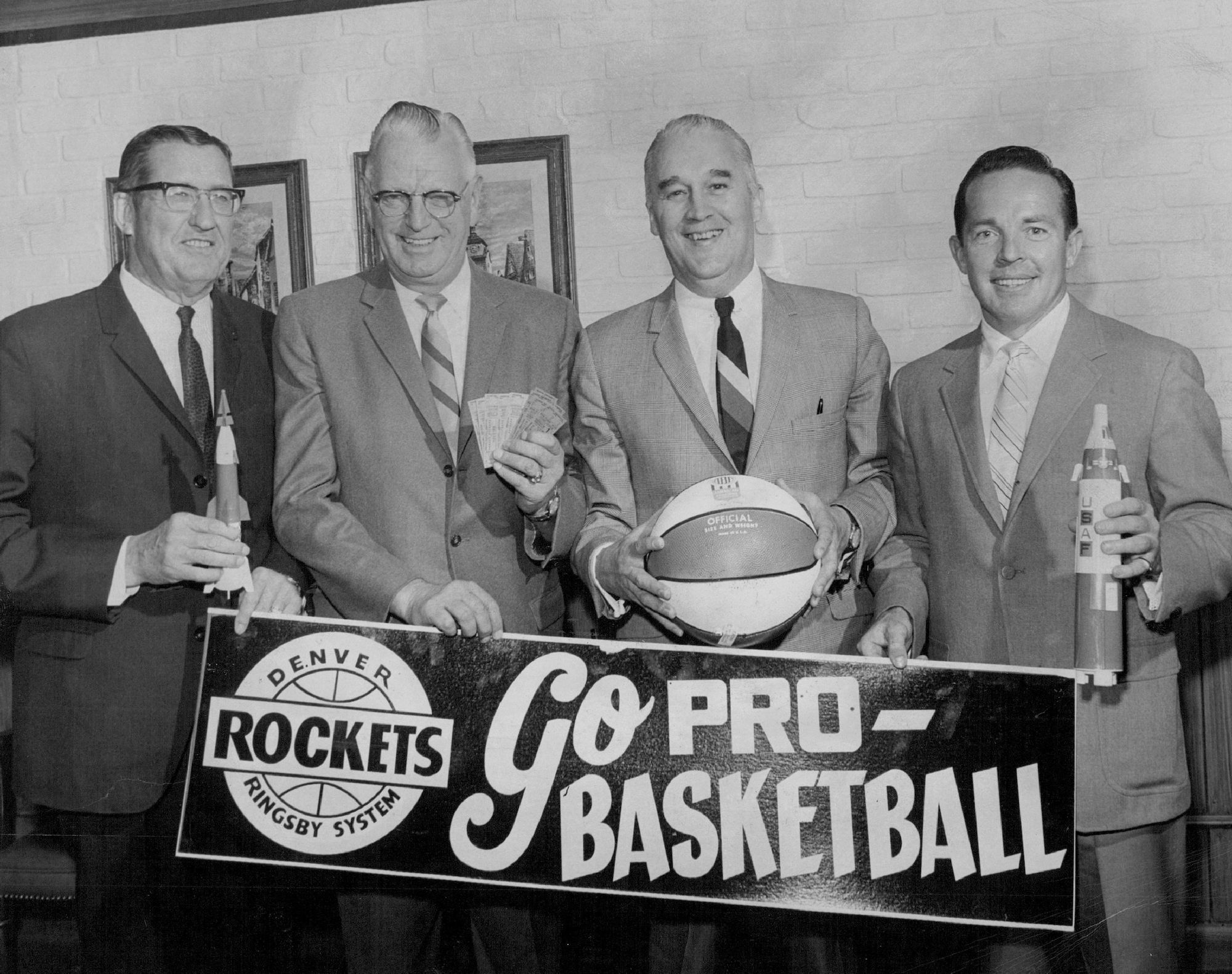 APR 28 1968; READY FOR ROCKET-TICKET CAMPAIGN; Jack Grunwald, right, will serve as general chairman of the Denver Rockets' season-ticket drive that will be launched with an organizational dinner meeting for 60 area businessmen Monday evening at the Denver Athletic Club. Grunwald headed last year's drive that set an ABA high of nearly 700 season tickets. Mapping plans are, from left. Rockets owner J. W. Ringsby, cochairmen Max Moore and Frank Byrne.; (Photo By The Denver Post via Getty Images)