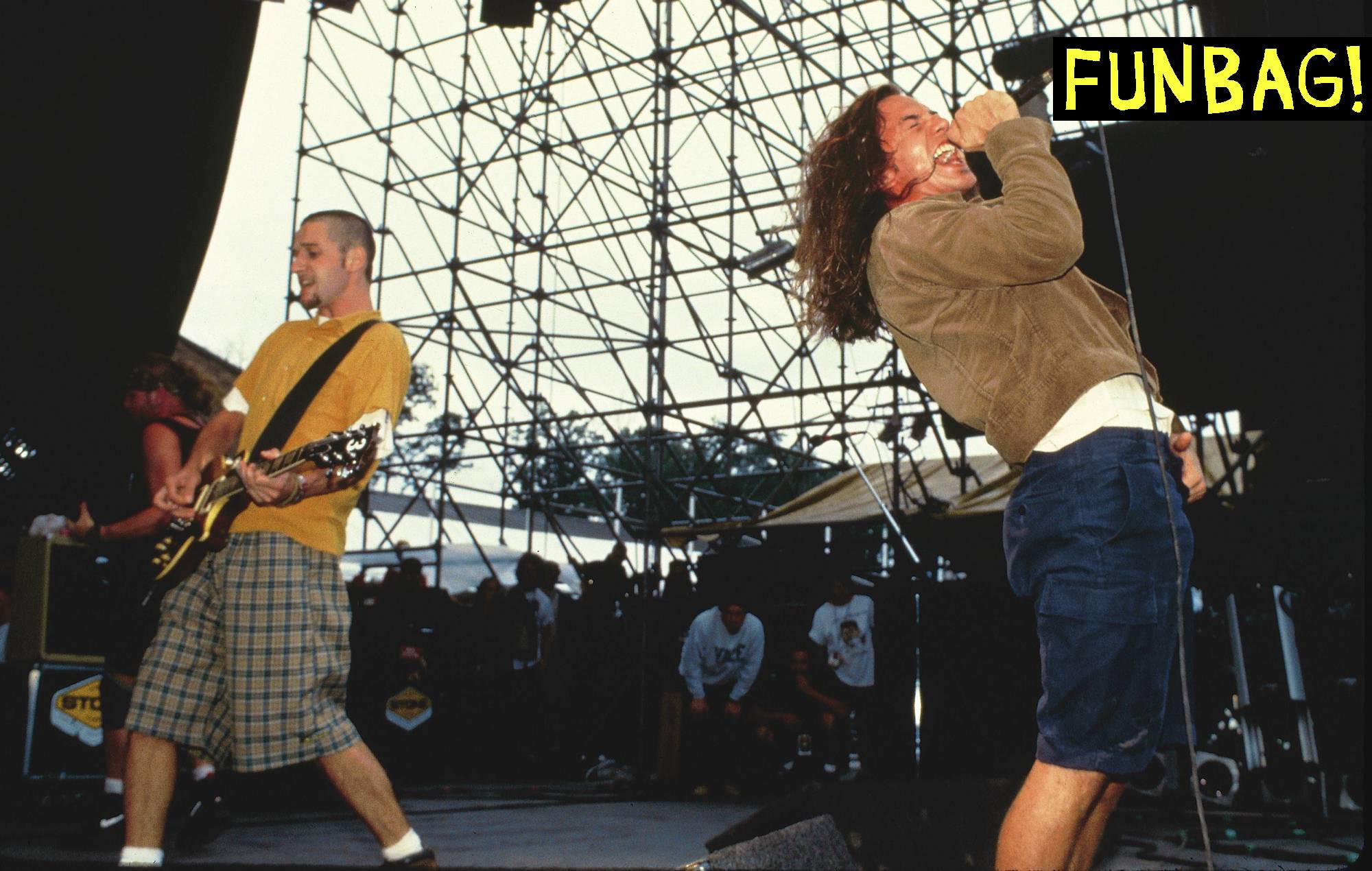 (MANDATORY CREDIT Ebet Roberts/Getty Images) UNITED STATES - AUGUST 01: LOLAPOLOOZA Photo of Eddie VEDDER and PEARL JAM and Stone GOSSARD, L-R: Stone Gossard and Eddie Vedder performing live onstage (Photo by Ebet Roberts/Redferns)