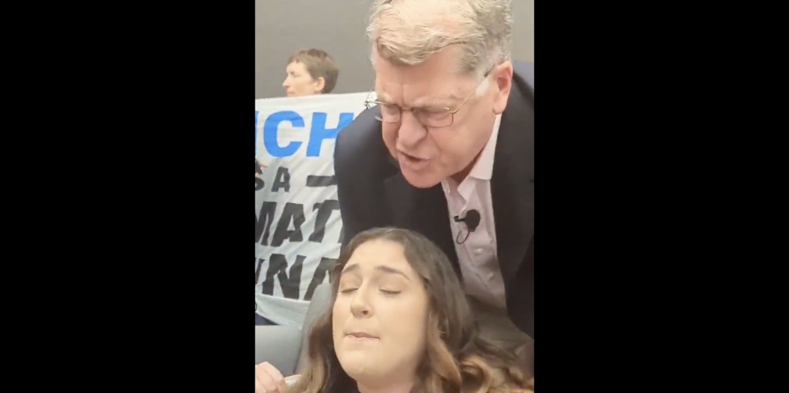 Steve Clemons screams at a climate activist