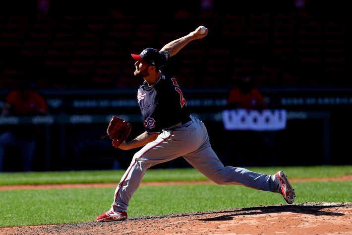 BOSTON, MASSACHUSETTS - AUGUST 30: Dakota Bacus #42 of the Washington Nationals pitches against the Boston Red Sox during the sixth inning at Fenway Park on August 30, 2020 in Boston, Massachusetts. All players are wearing #42 in honor of Jackie Robinson Day. The day honoring Jackie Robinson, traditionally held on April 15, was rescheduled due to the COVID-19 pandemic.