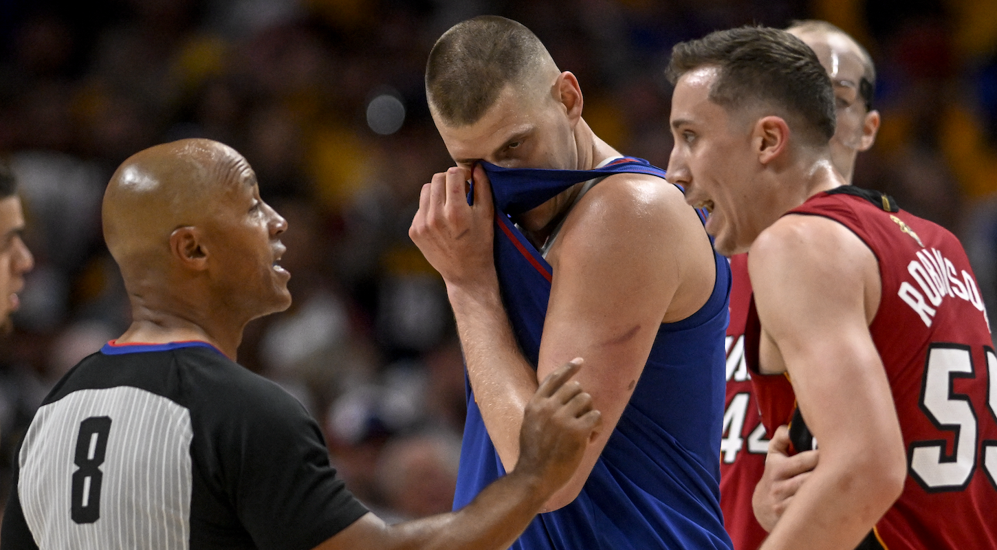 Miami's Duncan Robinson argues with referee Eric Davis during Game 1 of the NBA Finals