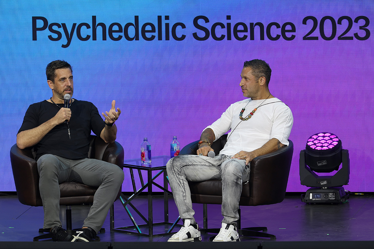 DENVER, COLORADO - JUNE 21: NFL Quarterback Aaron Rodgers participates in a talk with author Aubrey Marcus as part of Psychedelic Science 2023 in the Bellcor Theatre of the Colorado Convention Center on June 21, 2023 in Denver, Colorado.