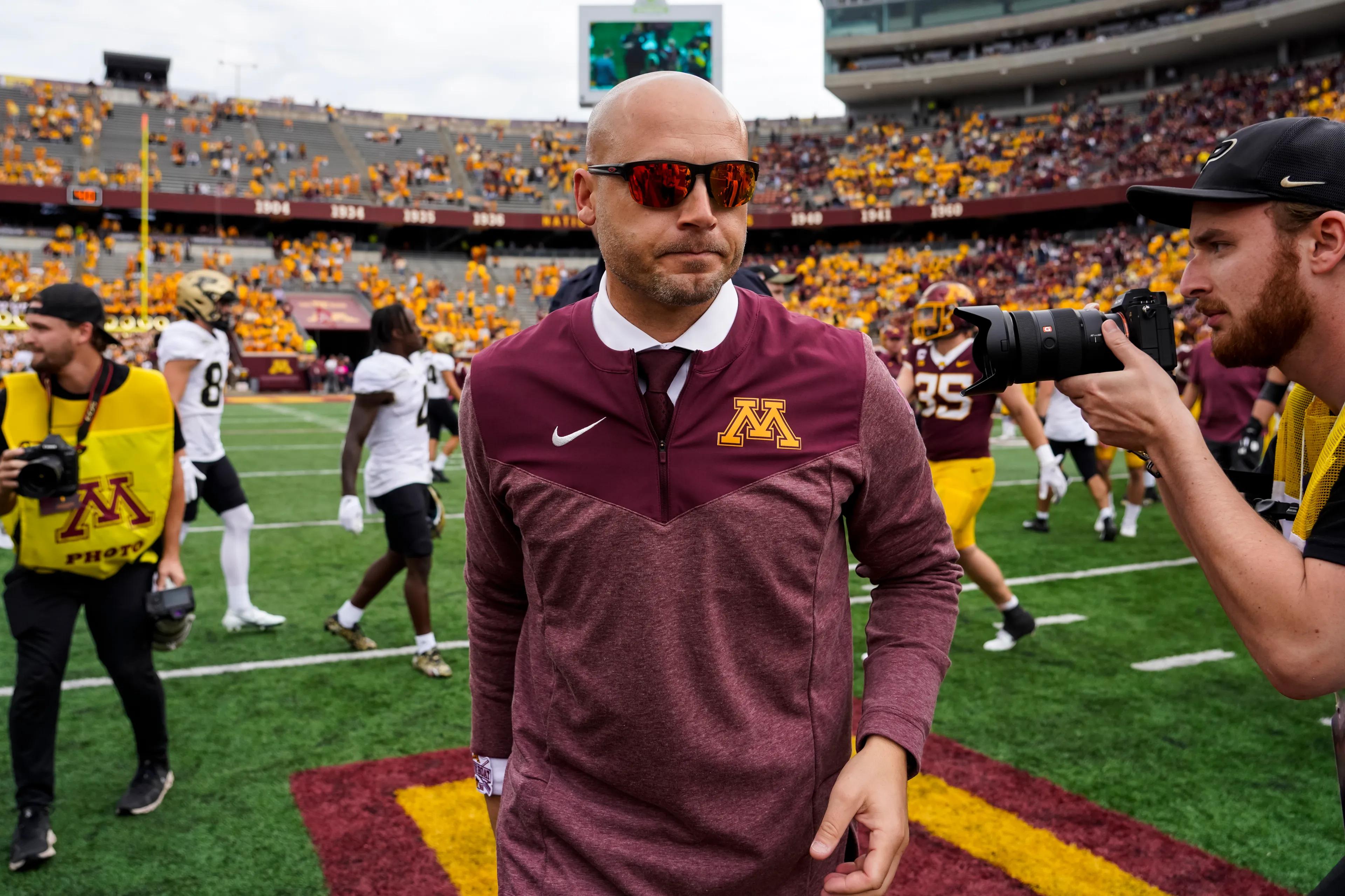 Head coach P.J. Fleck of the Minnesota Golden Gophers walks off the field against the Purdue Boilermakers at Huntington Bank Stadium on October 1, 2022 in Minneapolis, Minnesota. Purdue defeated Minnesota 20-10.