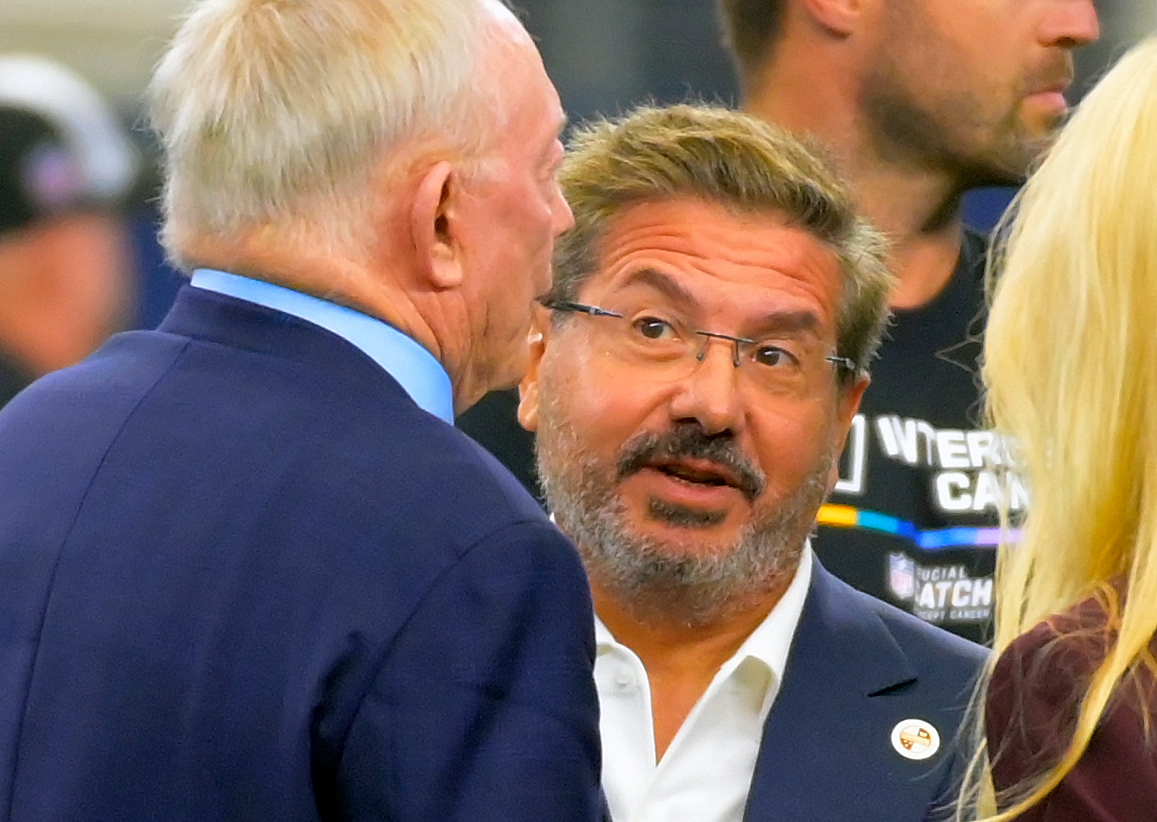 ARLINGTON, TX - OCTOBER 2: Washington Commanders owners Dan Snyder, right, talks to Cowboys owner Jerry Jones, left, before the Dallas Cowboys defeat of the Washington Commanders 25-10 at AT&amp;T Stadium on October 2, 2022 in Arlington, TX. (Photo by John McDonnell/The Washington Post via Getty Images)