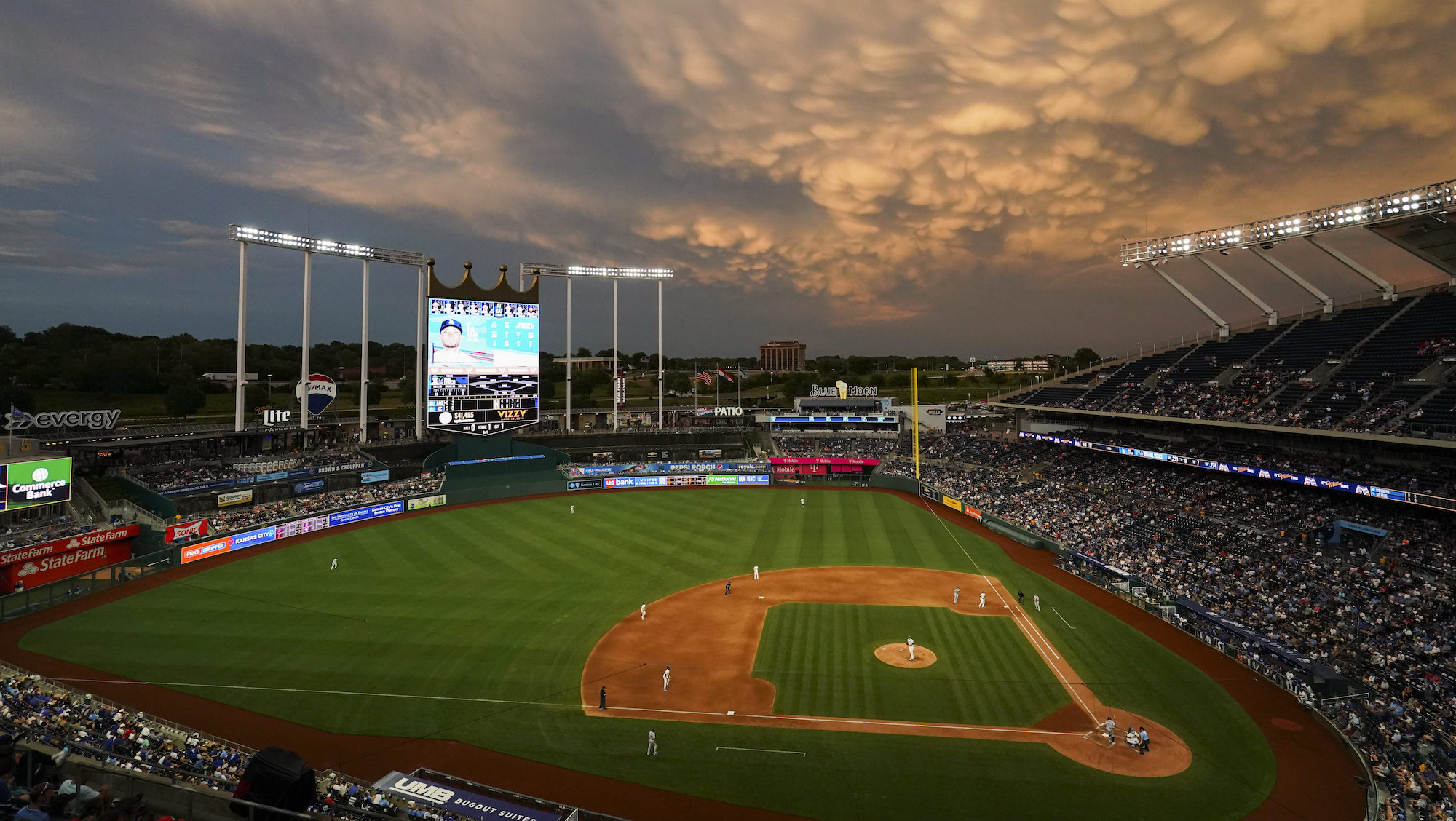 KANSAS CITY, MISSOURI - JULY 01:The sky lights up as the Kansas City Royals take on the Los Angeles Dodgers during the second inning at Kauffman Stadium on July 01, 2023 in Kansas City, Missouri. (Photo by Kyle Rivas/Getty Images) ***Local Caption***