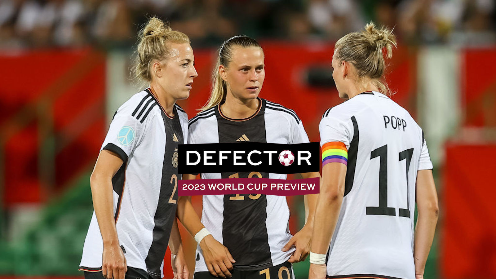 Carolin Simon of Germany, Klara Buehl of Germany and Alexandra Popp of Germany look on during the Women's international friendly between Germany and Zambia at Sportpark Ronhof Thomas Sommer on July 7, 2023 in Fuerth, Germany.
