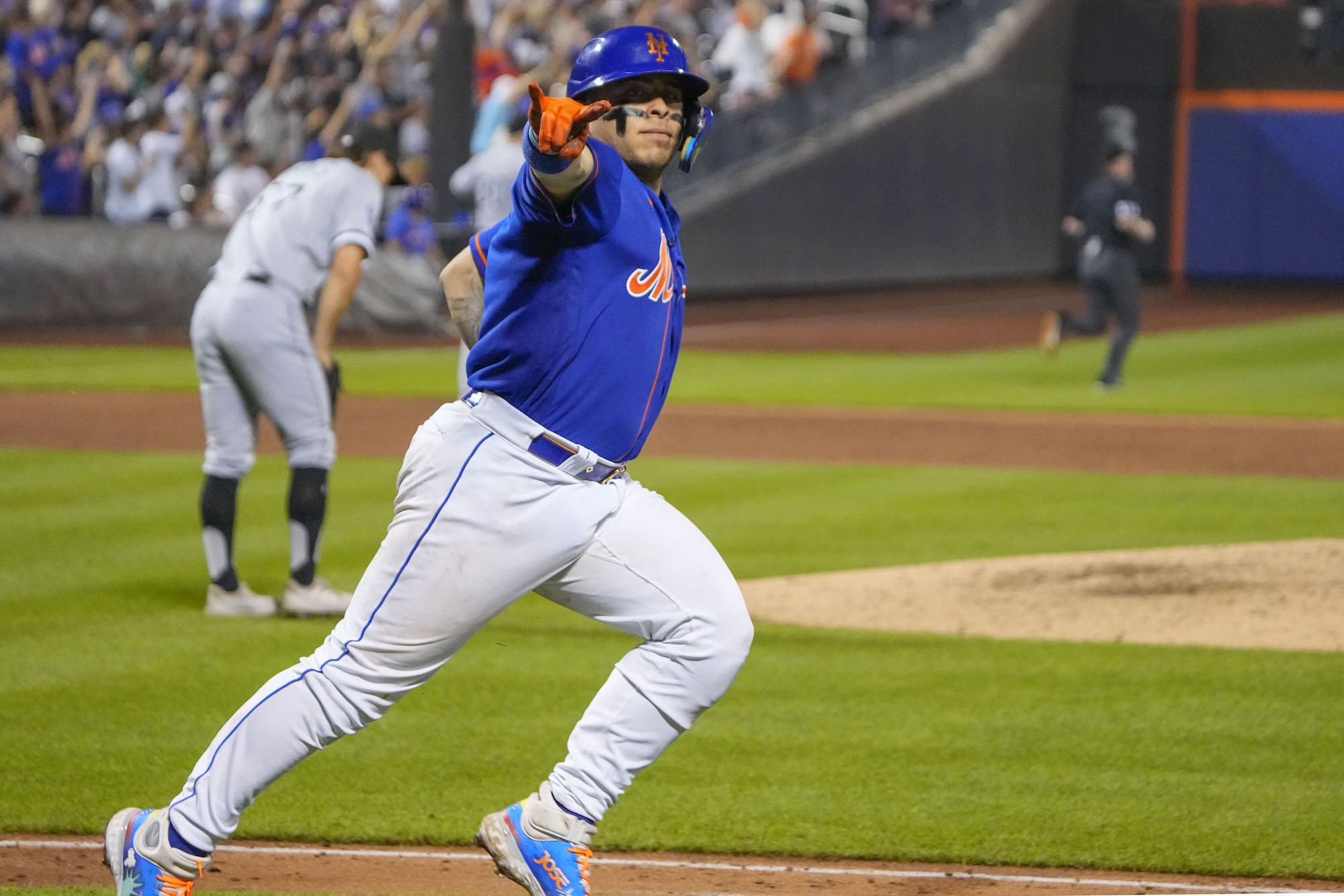 FLUSHING, NY - JULY 18: New York Mets Catcher Francisco Alvarez (4) reacts as he rounds the bases after hitting a two run home run during the sixth inning of the Major League Baseball game between the Chicago White Sox and New York Mets on July 18, 2023, at Citi Field in Flushing, NY. (Photo by Gregory Fisher/Icon Sportswire via Getty Images)