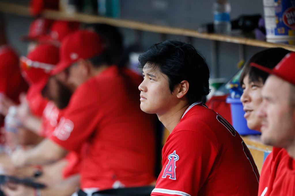 Shohei Ohtani watches from the dugout