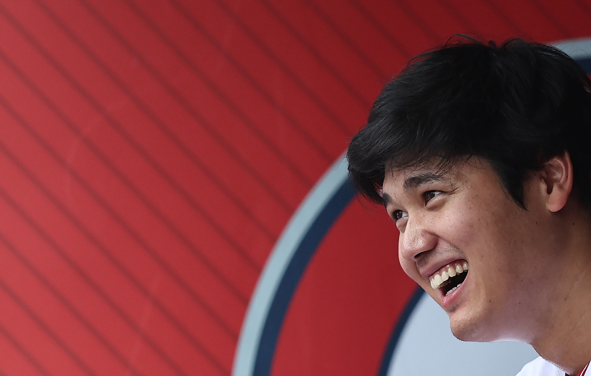 ANAHEIM, CALIFORNIA - JULY 23: Shohei Ohtani #17 of the Los Angeles Angels reacts in the dugout during the first inning of a game against the Pittsburgh Pirates at Angel Stadium of Anaheim on July 23, 2023 in Anaheim, California. (Photo by Michael Owens/Getty Images)