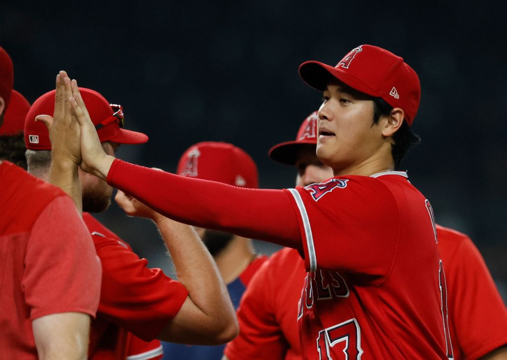 Shohei Ohtani celebrates with his Angels teammates