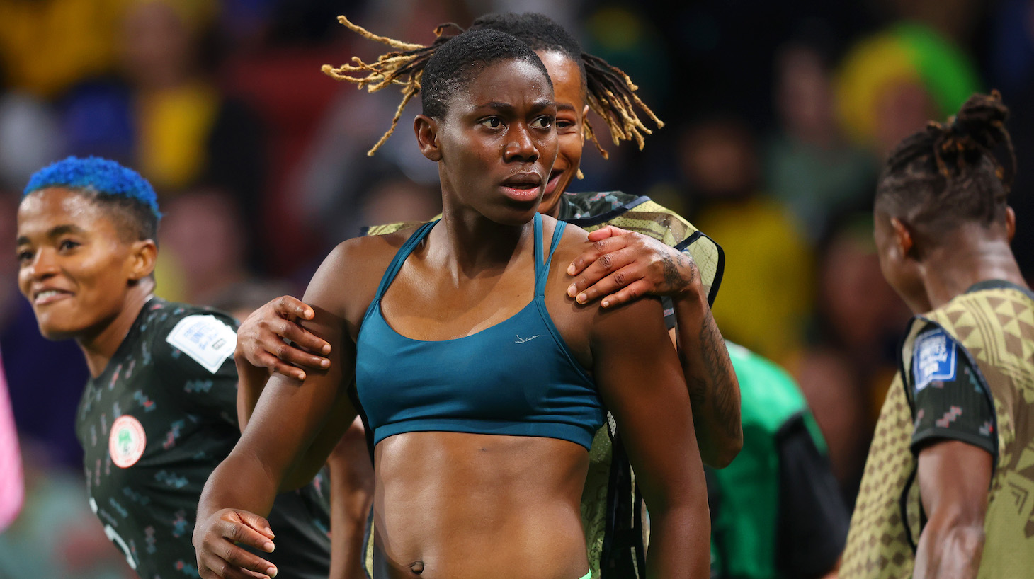 Asisat Oshoala of Nigeria celebrates with teammates after scoring her team's third goal during the FIFA Women's World Cup Australia & New Zealand 2023 Group B match between Australia and Nigeria at Brisbane Stadium on July 27, 2023 in Brisbane, Australia.