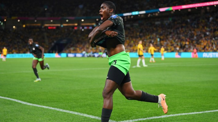 Asisat Oshoala of Nigeria celebrates after scoring her team's third goal during the FIFA Women's World Cup Australia & New Zealand 2023 Group B match between Australia and Nigeria at Brisbane Stadium on July 27, 2023 in Brisbane, Australia.