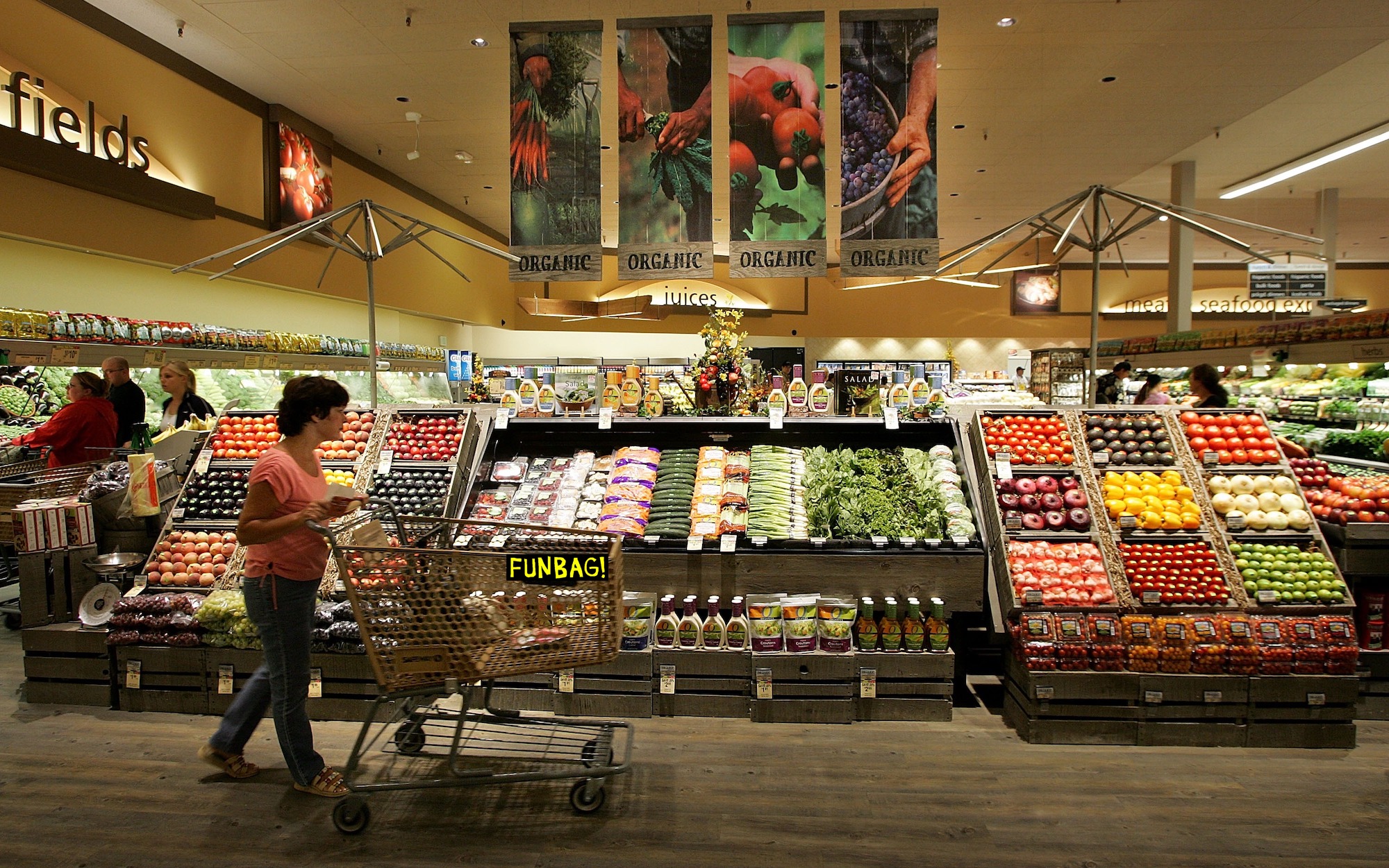 LIVERMORE, CA - JULY 18: A Safeway customer browses in the fruit and vegetable section at Safeway's new "Lifestyle" store July 18, 2007 in Livermore, California. Safeway unveiled its newest Lifestyle store that features numerous organic and natural foods as well as expanded produce, meat, seafood and floral departments. The store also offers freshly made desserts and baked goods, a coffee roaster, a fresh nut bar and wine section with over 2,000 wines, some of which are stored in a climate controlled wine cellar. (Photo by Justin Sullivan/Getty Images)