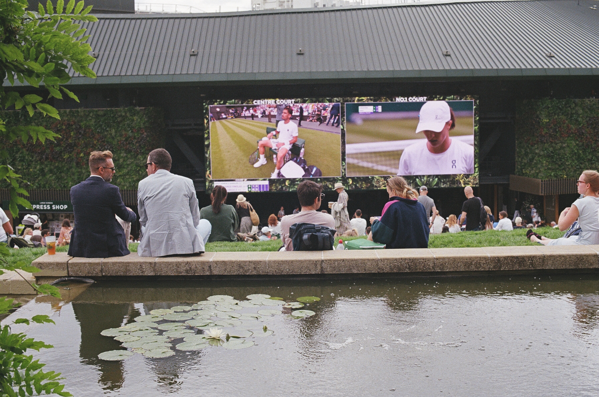 Fans take in some Wimbledon matches at Murray Mound.