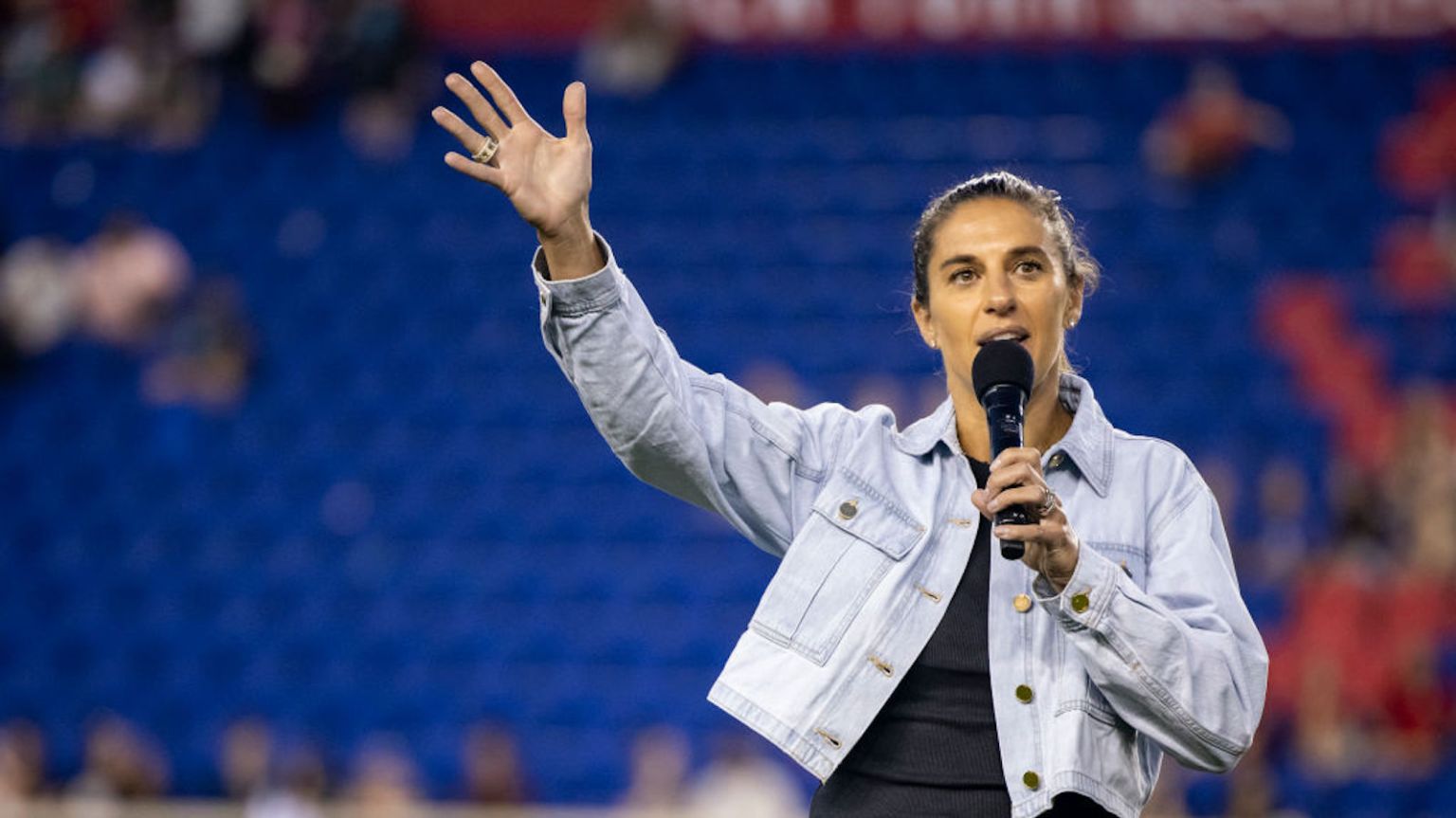 Christen Press Draped Around Tobin Heath in the Snow