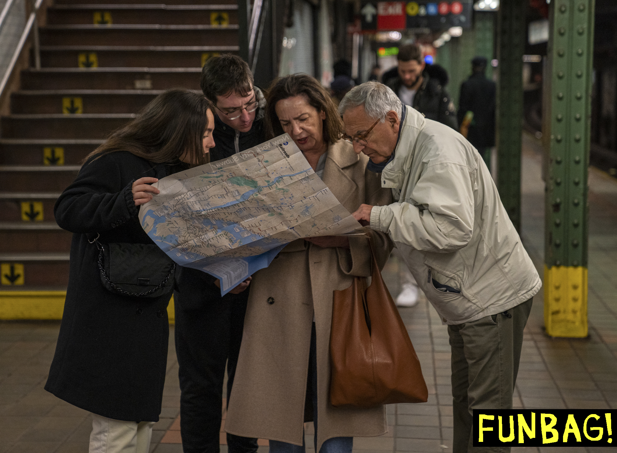 NEW YORK, NY - APRIL 3: Out of town tourists check a subway map on April 3, 2023 in New York City. Officials in New York City expect 61 million tourists to visit in 2023, an increase of 9% over 2022 figures of 56.4 million. (Photo by Robert Nickelsberg/Getty Images)
