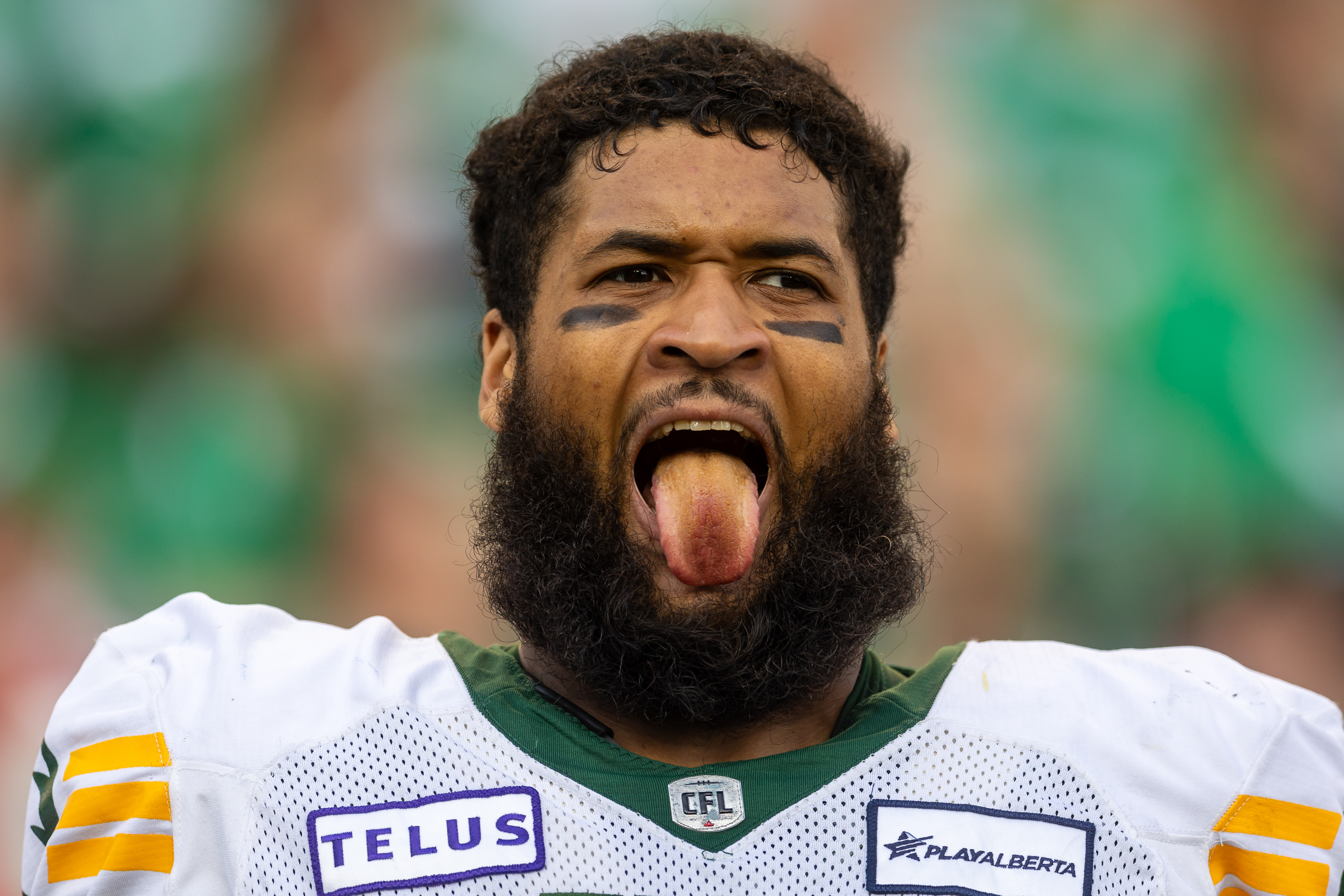 REGINA, CANADA - JULY 6: Tomas Jack-Kurdyla #64 of the Edmonton Elks on the sideline before the game between the Edmonton Elks and Saskatchewan Roughriders at Mosaic Stadium on July 6, 2023 in Regina, Canada. (Photo by Brent Just/Getty Images)