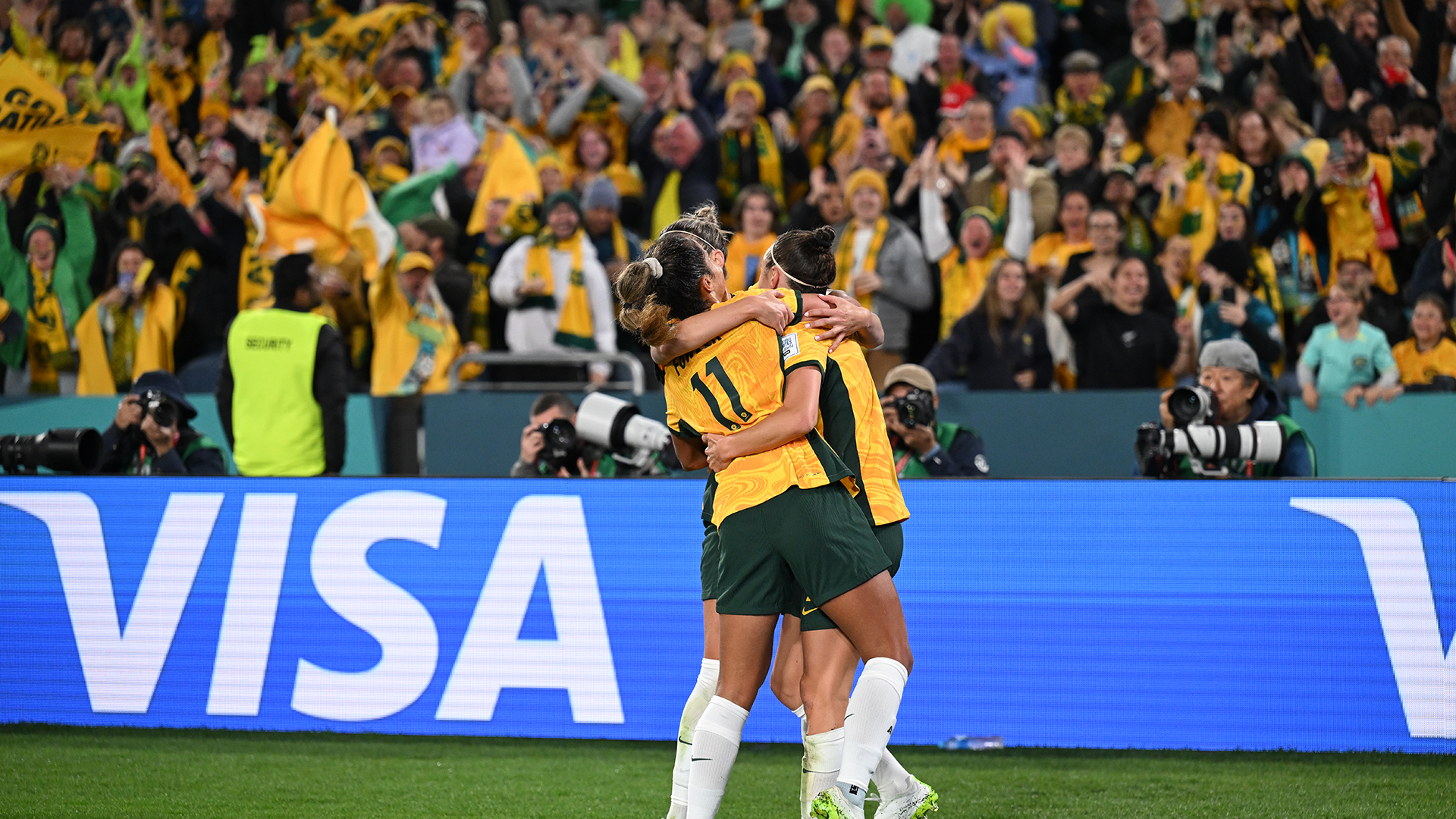 Caitlin Foord of Australia celebrates after scoring her team's first goal with teammates during the FIFA Women's World Cup Australia &amp; New Zealand 2023 Round of 16 match between Australia and Denmark at Stadium Australia on August 7, 2023 in Sydney, Australia.
