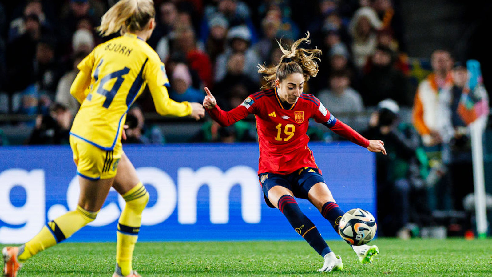 Olga Carmona of Spain (R) attempts a kick while being defended by Nathalie Bjorn of Sweden (L) during the FIFA Women's World Cup Australia &amp; New Zealand 2023 Semi Final match between Spain and Sweden at Eden Park on August 15, 2023 in Auckland, New Zealand.