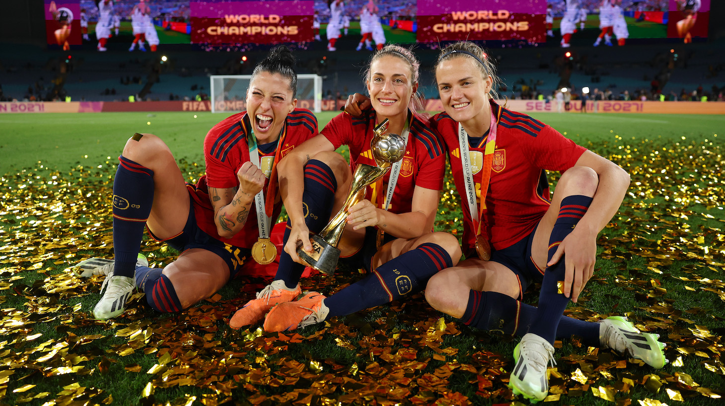 Jennifer Hermoso, Alexia Putellas and Irene Paredes of Spain celebrate with the FIFA Women's World Cup Trophy after the team's victory in the FIFA Women's World Cup Australia &amp; New Zealand 2023 Final match between Spain and England at Stadium Australia on August 20, 2023 in Sydney / Gadigal, Australia.