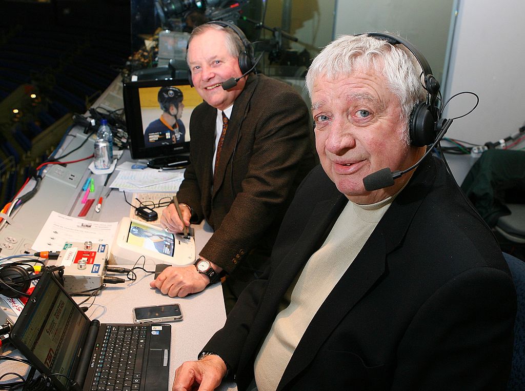 Veteran broadcasters Harry Neale (left) and Rick Jeanneret (right) of the Buffalo Sabres get ready for their game