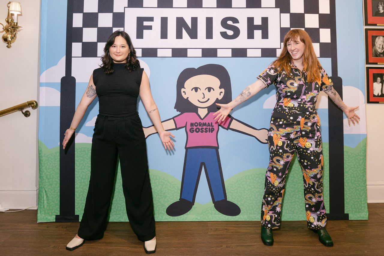 Alex Sujong Laughlin and Kelsey McKinney standing beside Flat Margaret.
