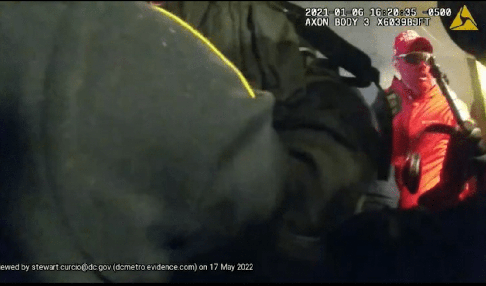 Still from a police body camera showing Rally Runner at the Jan. 6 riot