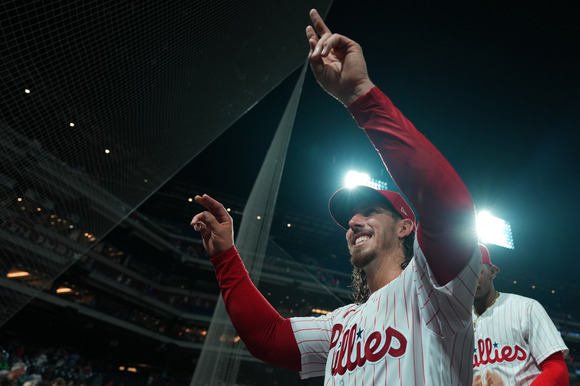 A photo of Michael Lorenzen pointing to the sky after he pitched a no hitter for the Philadelphia Phillies.