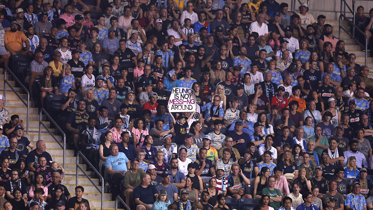 CHESTER, PENNSYLVANIA - AUGUST 15: A fan holds a sign in the stands during the Leagues Cup 2023 semifinals match between Inter Miami CF and Philadelphia Union at Subaru Park on August 15, 2023 in Chester, Pennsylvania.