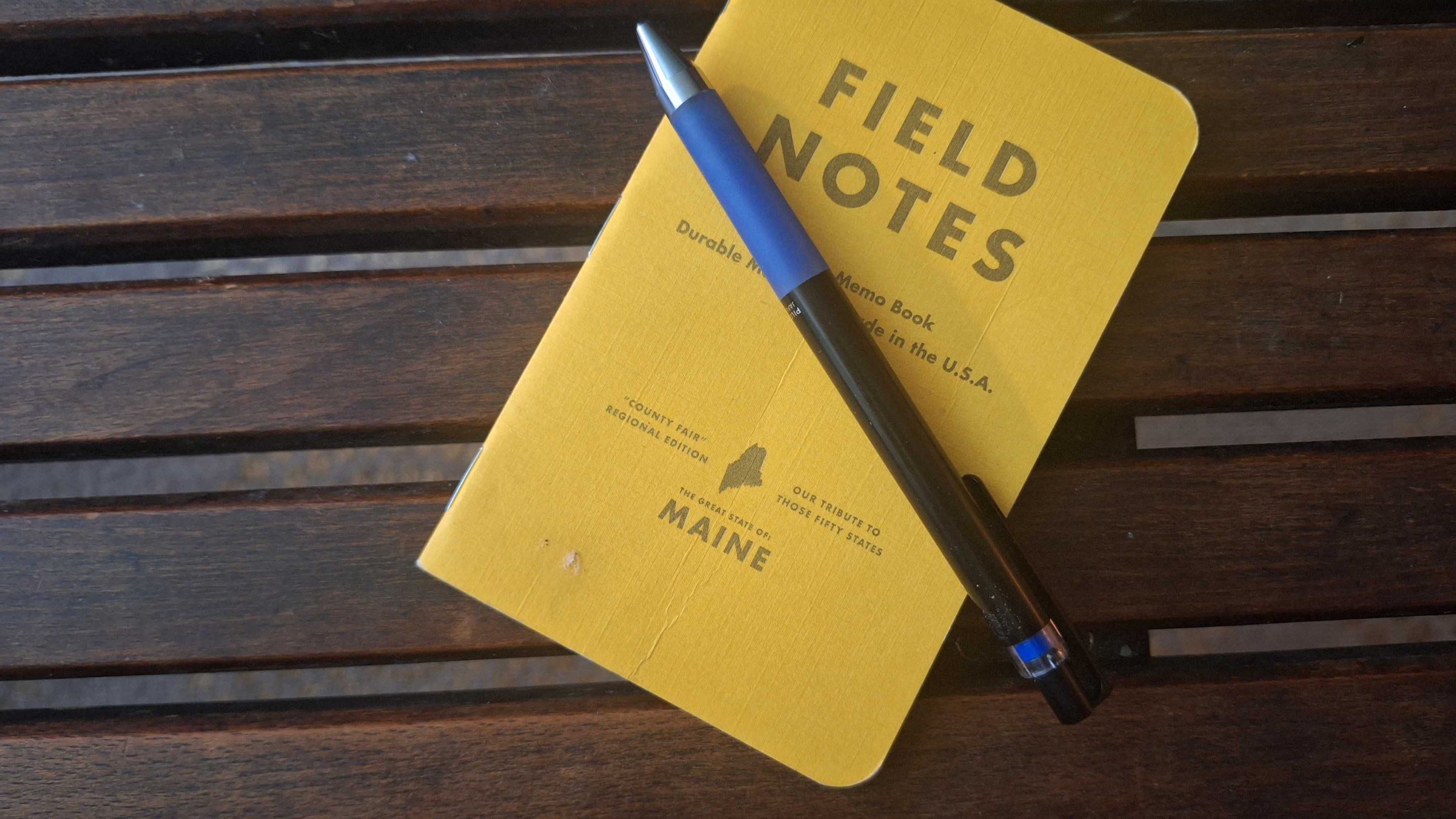 "Field Notes" notebook with pen