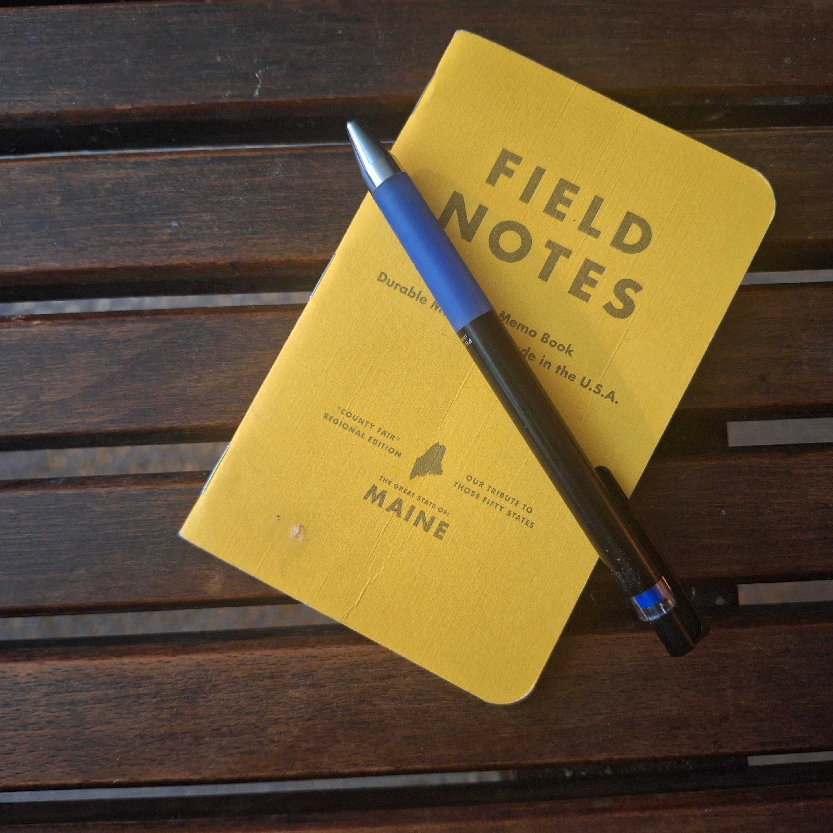 "Field Notes" notebook with pen