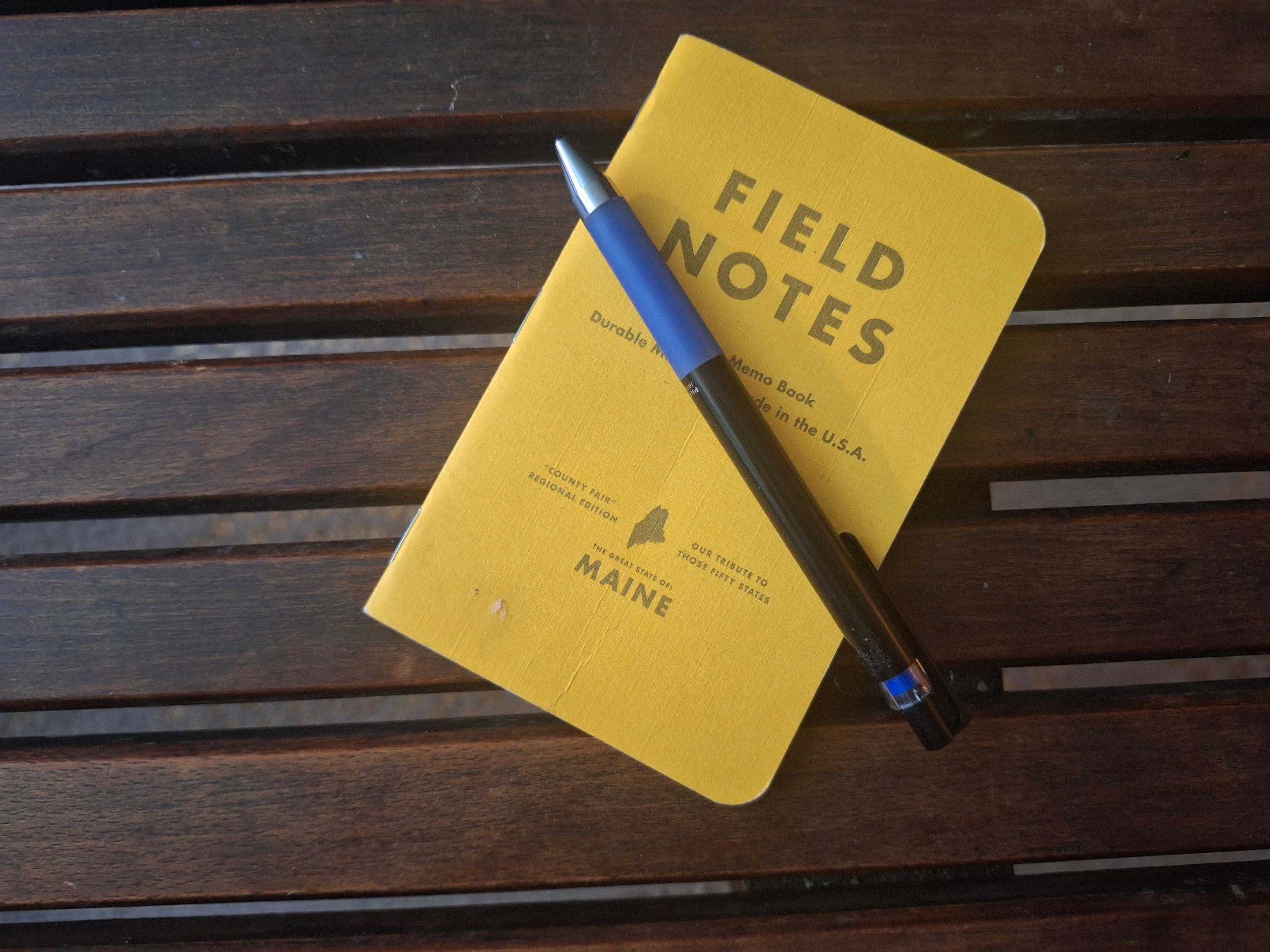 "Field Notes" notebook with pen