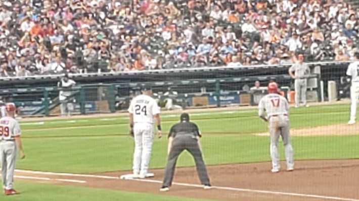 Miguel Cabrera playing first as Shohei Ohtani leads off, as seen from my zoomed-in phone camera in the stands.