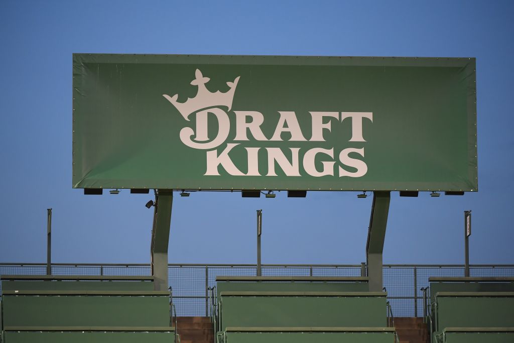 A general view of a DraftKings advertisement on top of the Green Monster during the ALS Awareness college baseball game between the Notre Dame Fighting Irish and the Boston College Eagles on May 19, 2023, at Fenway Park in Boston, MA.