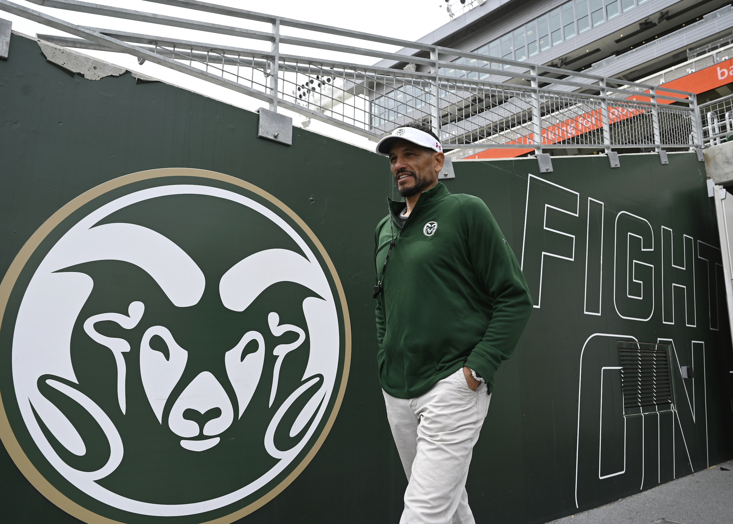 Colorado State Rams head football coach Jay Norvell enter the field for pregame warmups.
