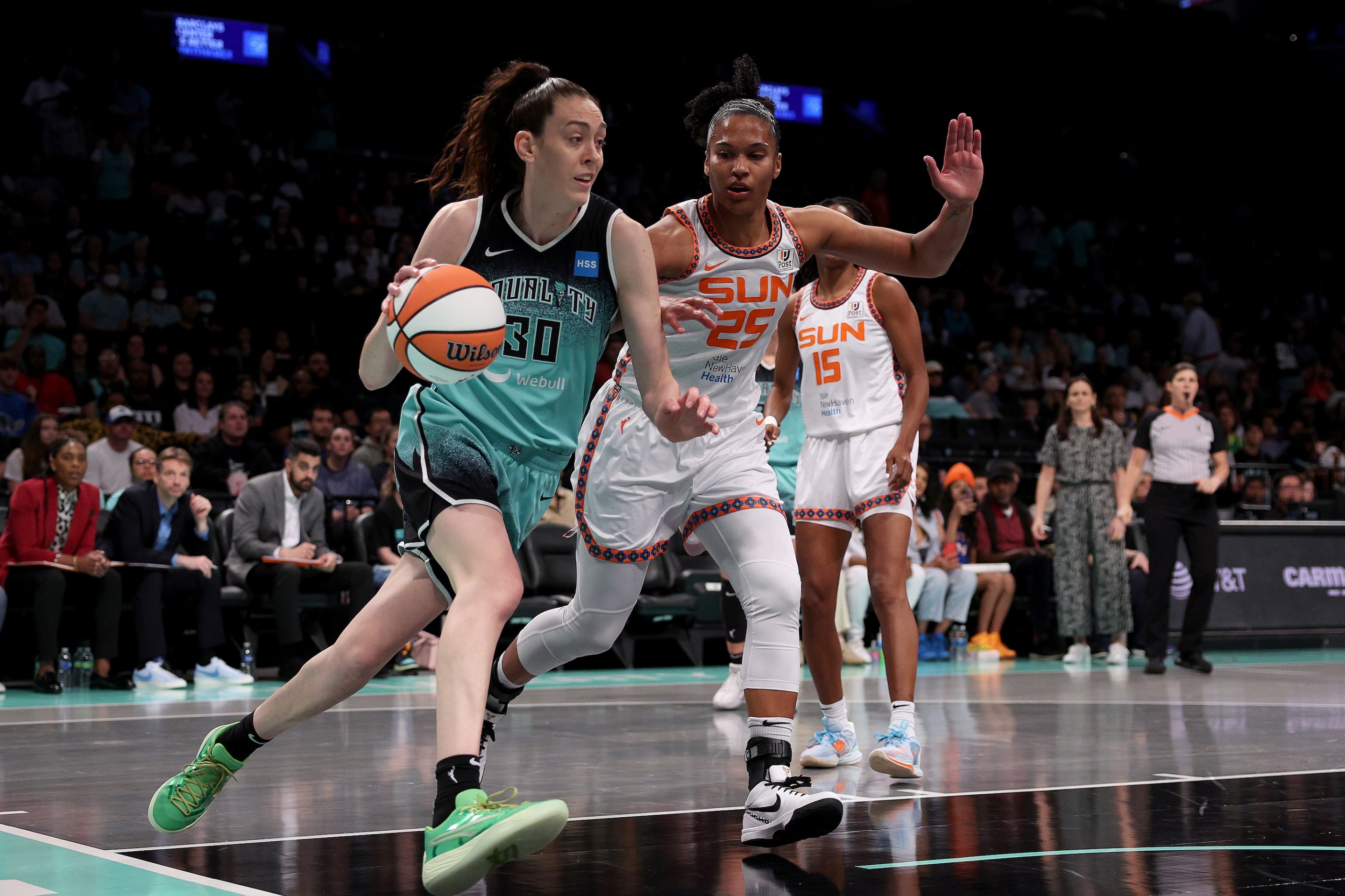 Breanna Stewart #30 of the New York Liberty drives as Alyssa Thomas #25 of the Connecticut Sun defends at Barclays Center on May 27, 2023 in the Brooklyn borough of New York City.