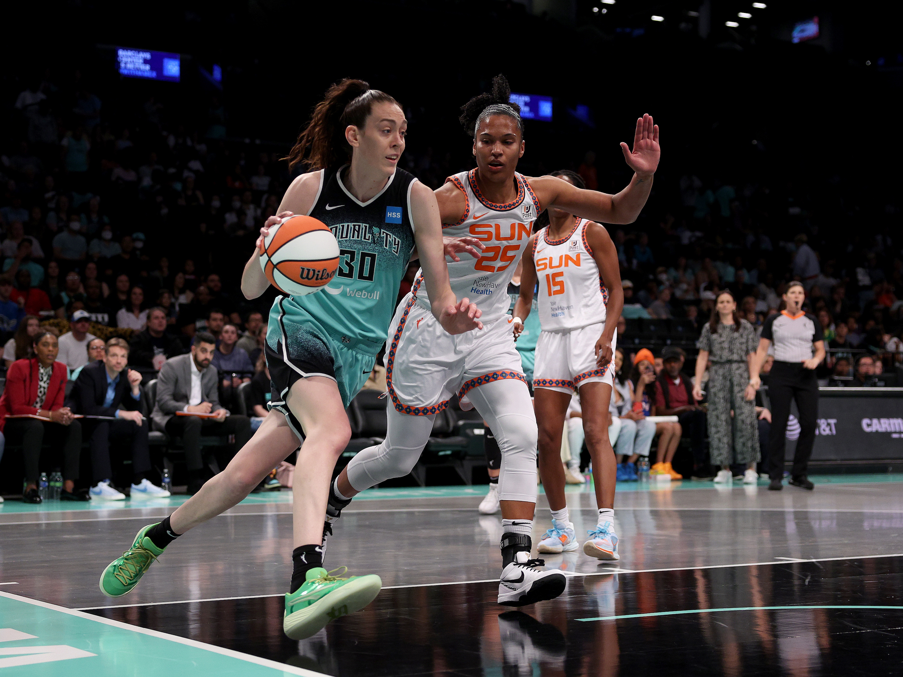 Breanna Stewart #30 of the New York Liberty drives as Alyssa Thomas #25 of the Connecticut Sun defends at Barclays Center on May 27, 2023 in the Brooklyn borough of New York City.